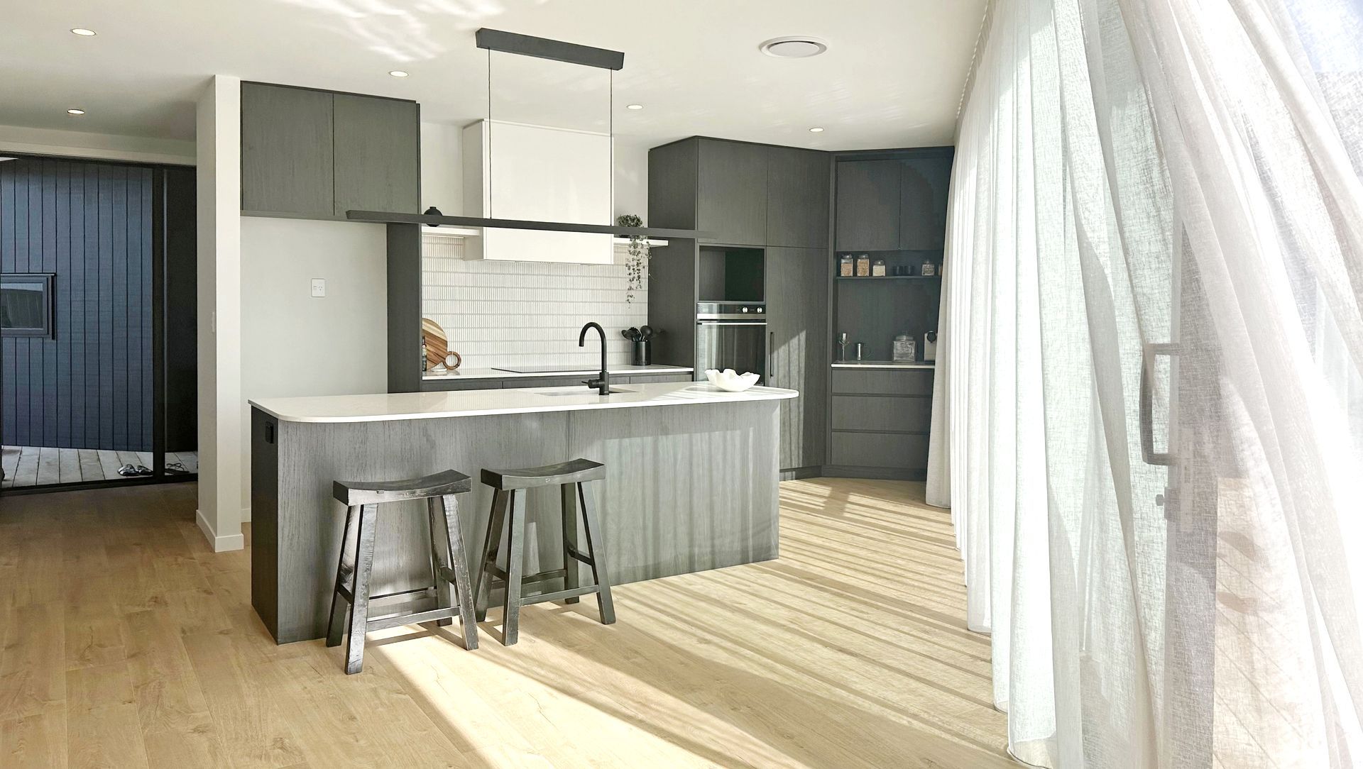 Black Birch ply with rounded Stone tops banner