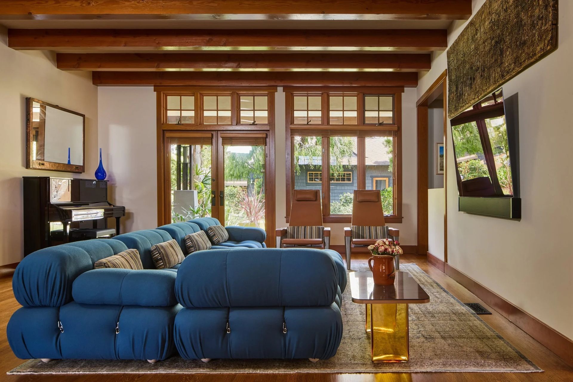 modern-craftsman-living-room-blue-modular-sofa-exposed-wood-beamswebp-ap-compressed.jpg