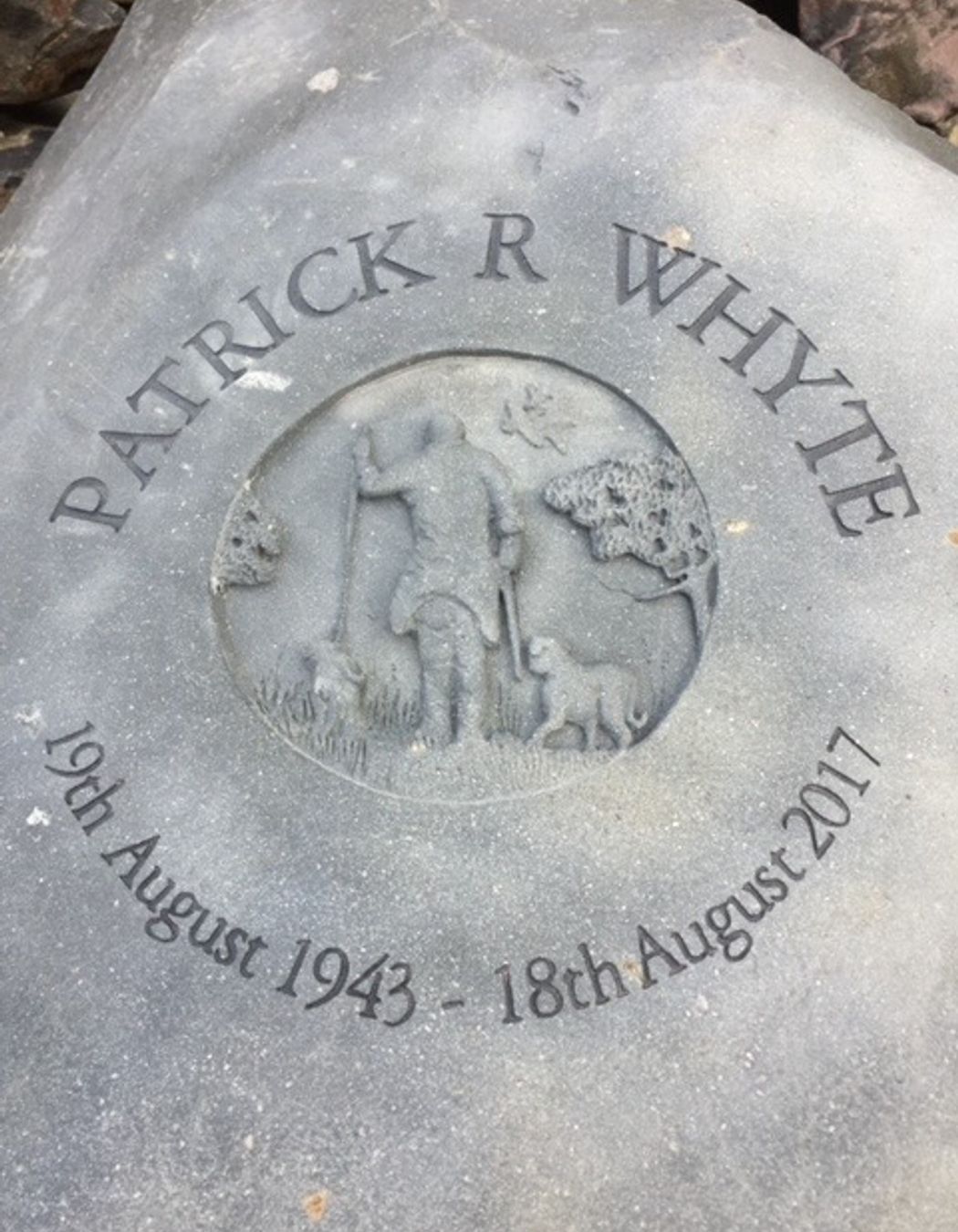 Carved memorial stone by Paul Gautron