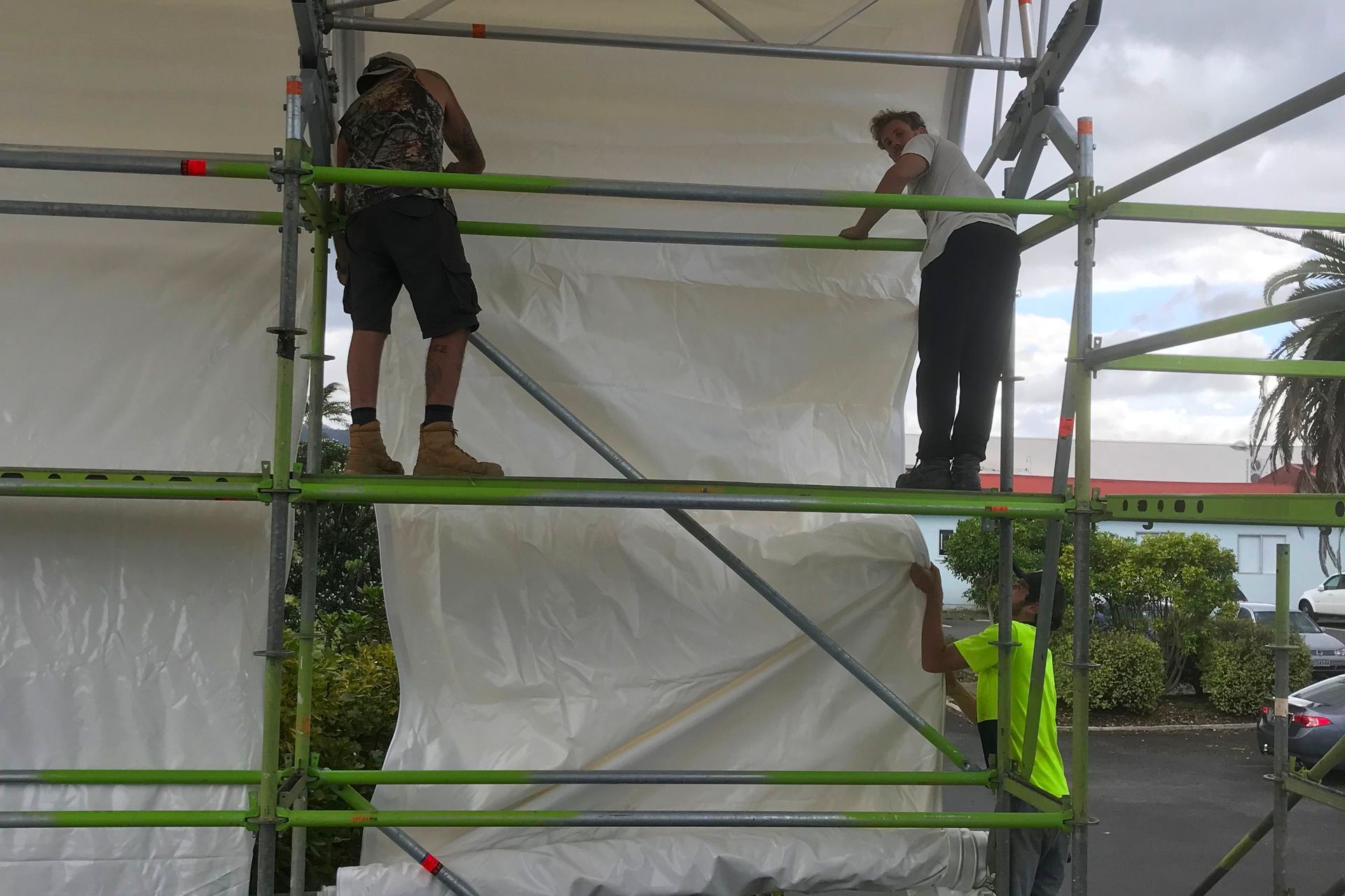 PVC roof &amp; wall tarpaulins are inserted safely (by pulling through a track). There is no need for personnel to work on top of the structure. These roof and wall tarpaulins are environmentally friendly, as they are reusable and reduce landfill shrinkwrap.