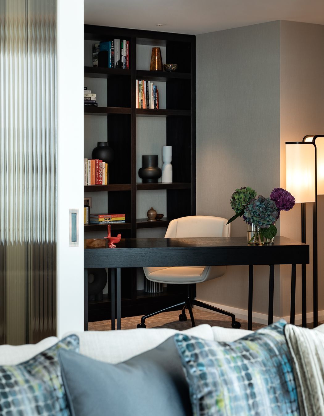 The Chairman suite features an office space complete with library shelving.