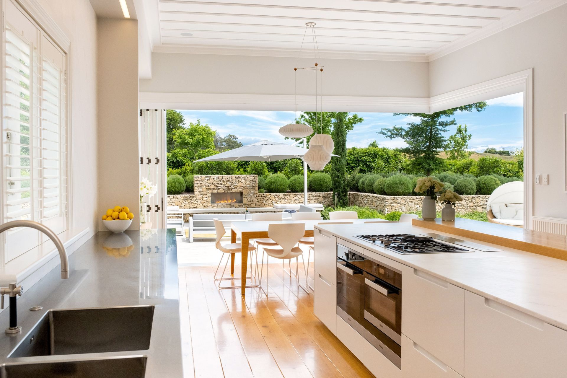 Hand-crafted modern kitchen supplied by Park Hill Joinery along with molded ceiling batons.