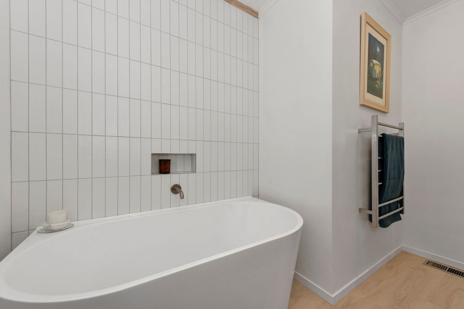 A Lovely Pair of Bathrooms and a Functional Laundry Unit