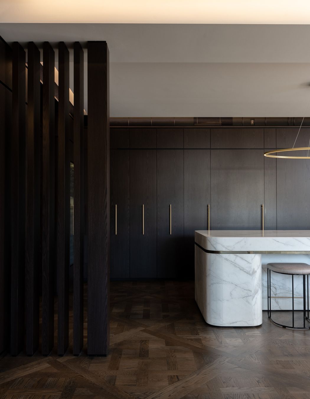 Bespoke joinery and a curved marble bench