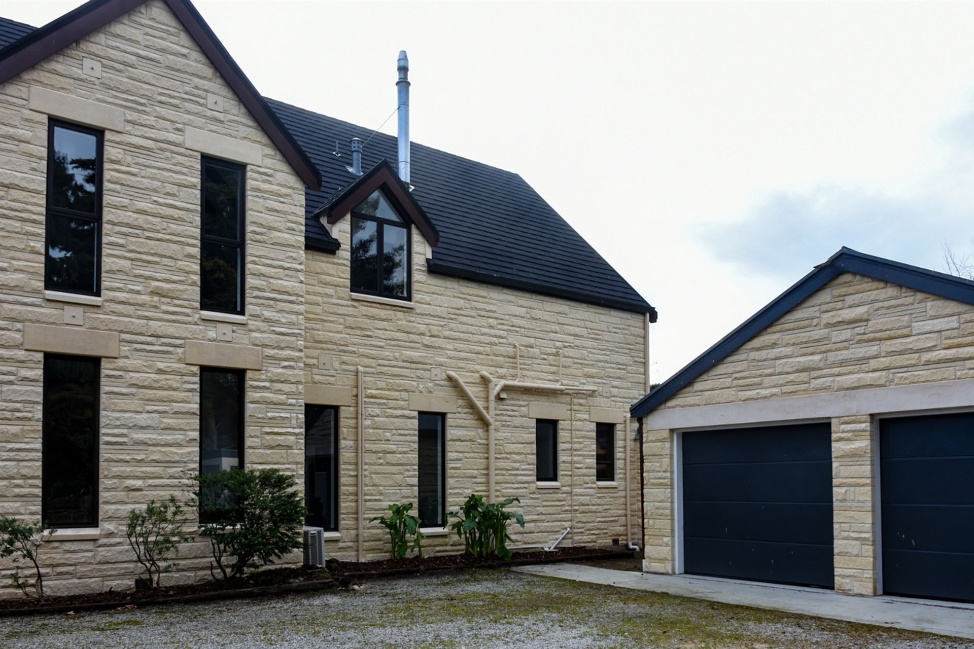 New roofing, double-glazed windows, bargeboards, cleaned/restored Oamaru stonework.