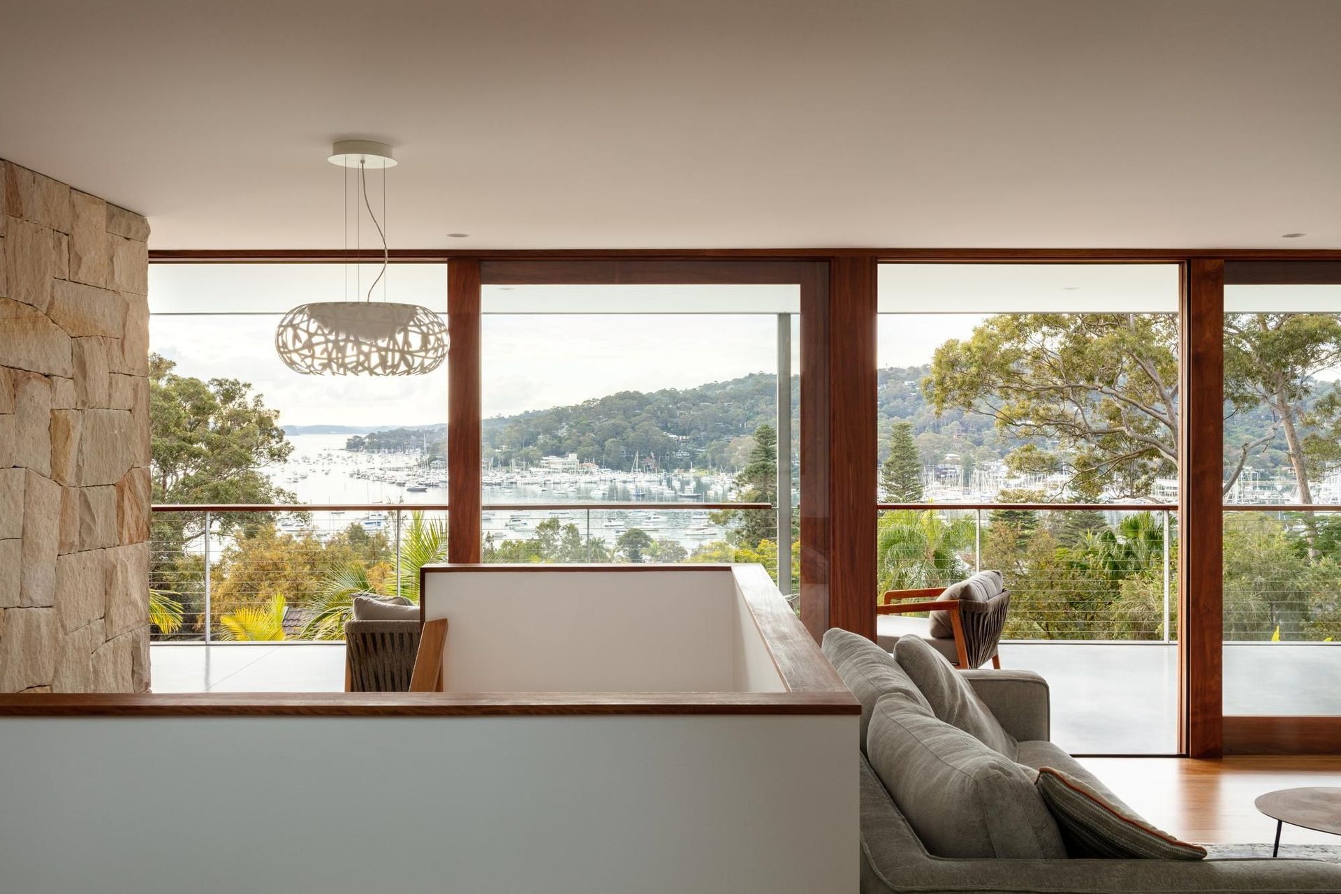 17-Matt-Day-Architect-Matt-Day-Bayview-House-Living-Upper-Deck-Timber-Sandstone.jpg