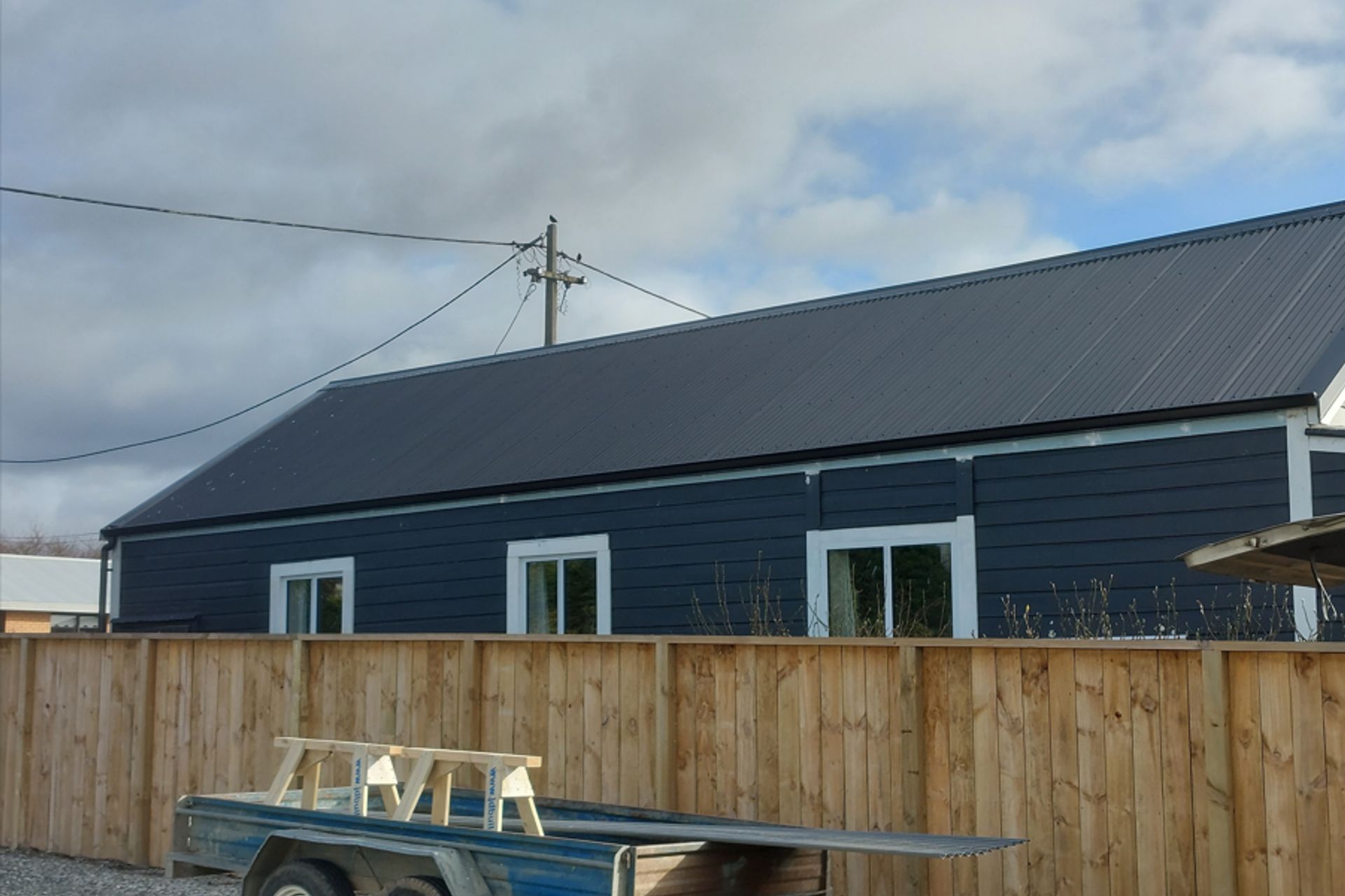 Completion of roofing looking westward