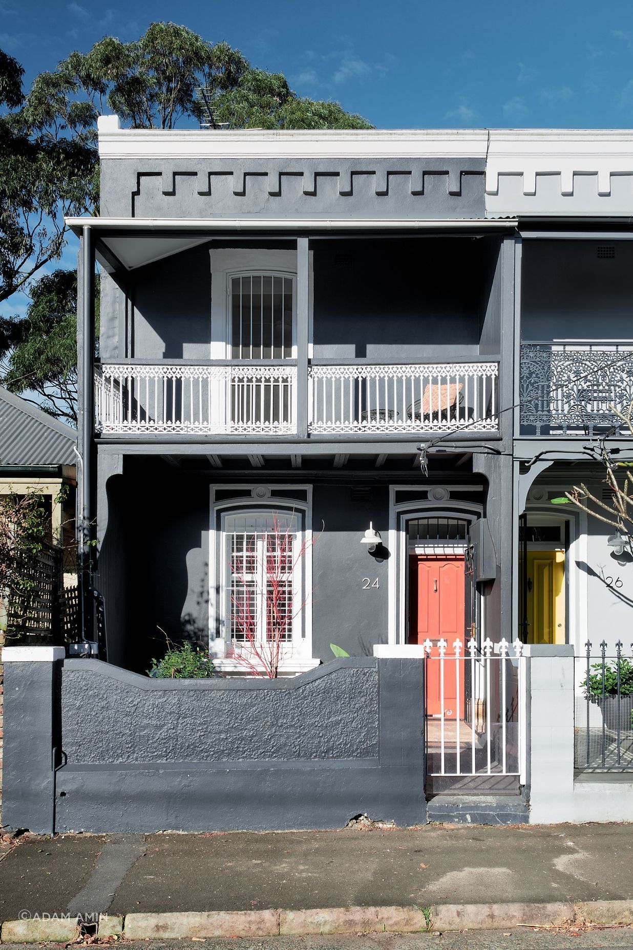 The Victorian terrace frontage, iconic to the streetscape, has been restored with modern hues.