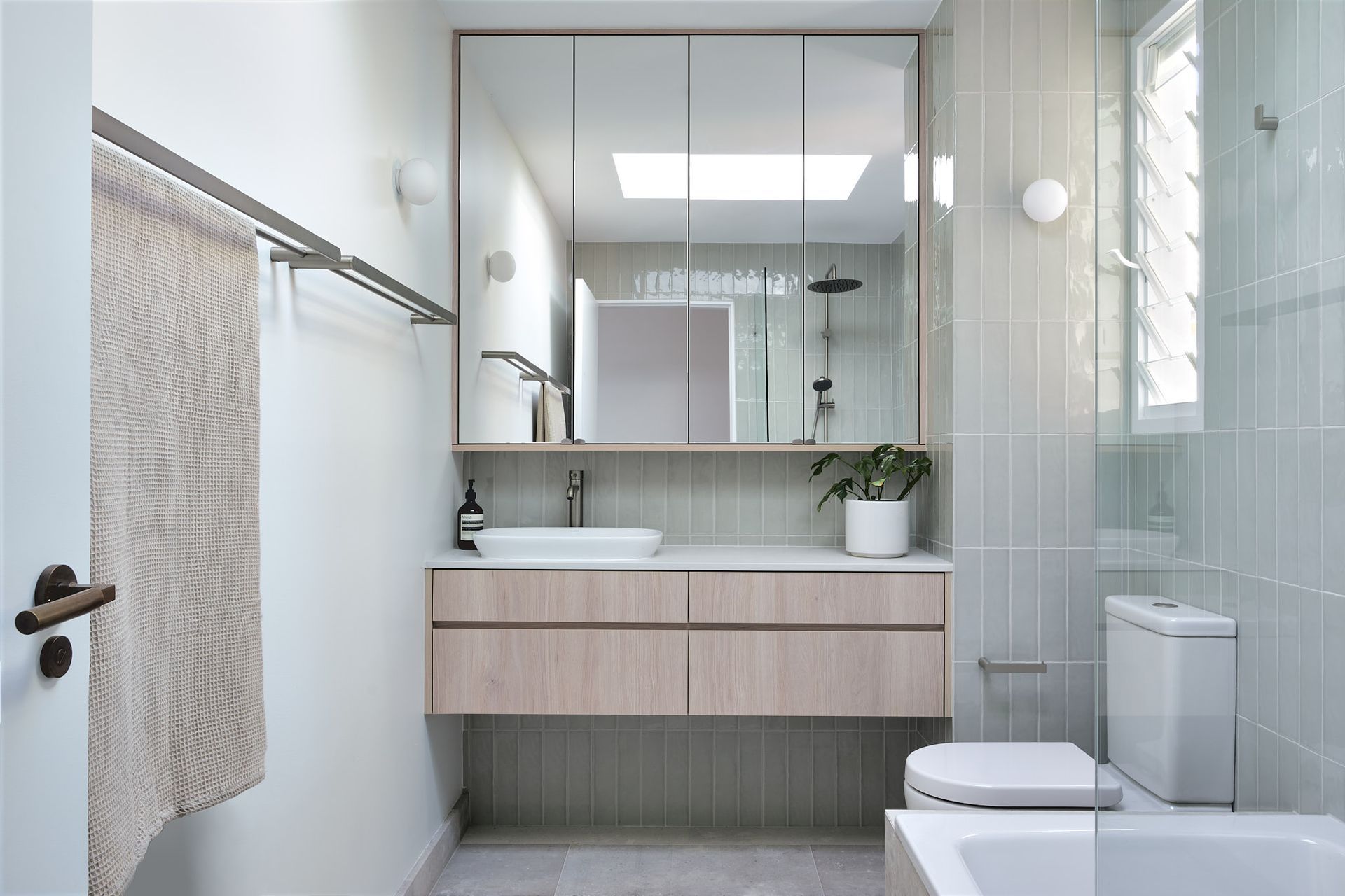 The first storey has been designated green hues used as an accent through the various rooms on this level.