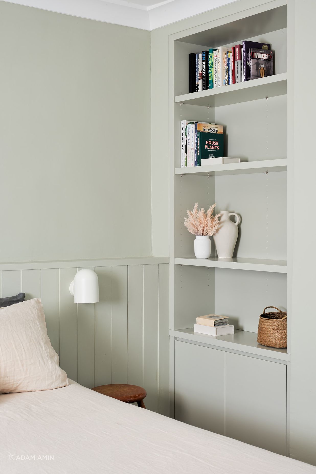 The use of custom joinery is further employed, creating an incidental shelf above the bed as a bedhead and open cabinetry for personalised items.