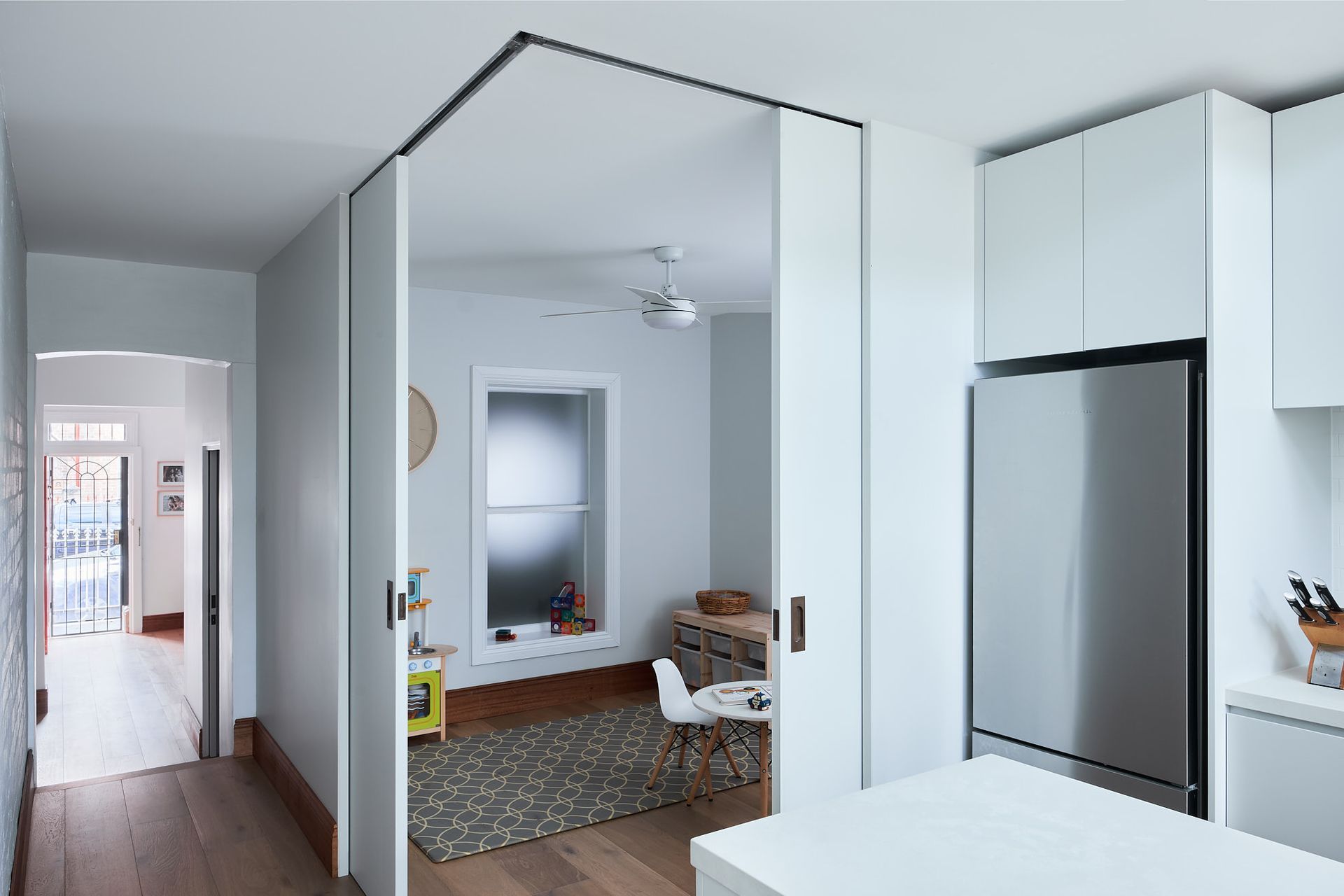 As the need for a growing family evolves, the operable walls allow the occupants to reconfigure the space as needed- maximising the versatility of a small footprint structure.