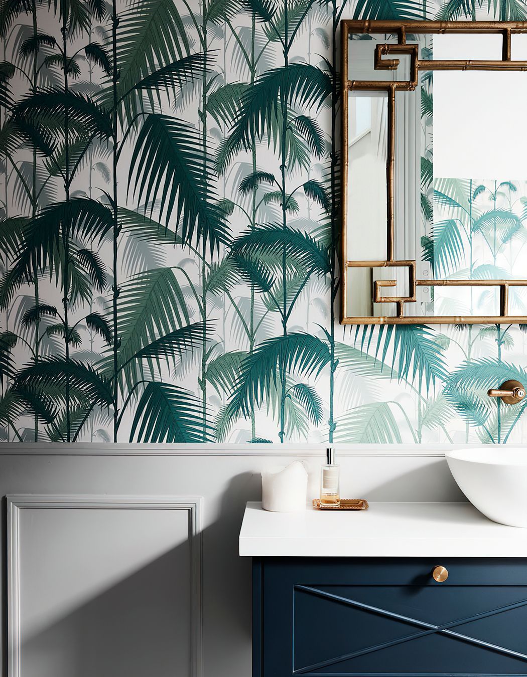 BRITISH COLONIAL STYLE POWDER ROOM - This powder room packs a punch featuring fern wallpaper, custom joinery and chrome bamboo framed mirror.