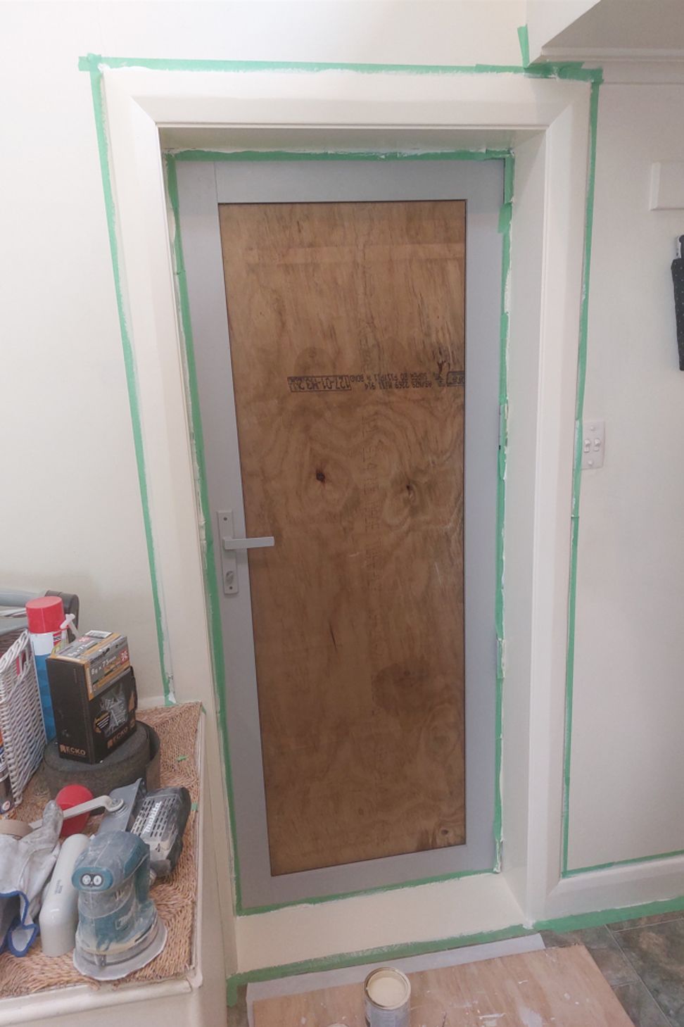 5-19-Tweed-St-Roslyn-Dunedin-Interior-showing-newly-installed-back-door-being-painted-double-glazing-to-be-installed-in-the-next-few-days-JDBuilders.jpg