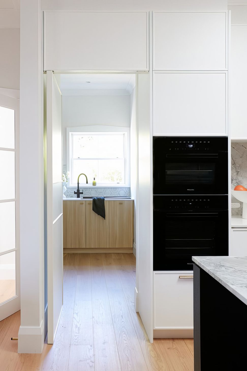 Open Hidden Door with Pivot Hinge to Butlers Pantry