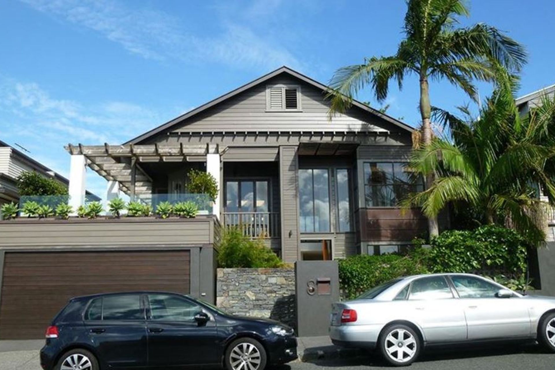 The house as we found it with modern additions and a dark colour palette done in the 1990s.