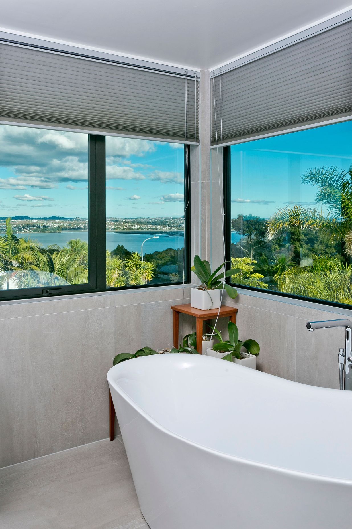 Double aspect windows provide an enviable view back across the harbour, to be enjoyed from the slipper bathtub.