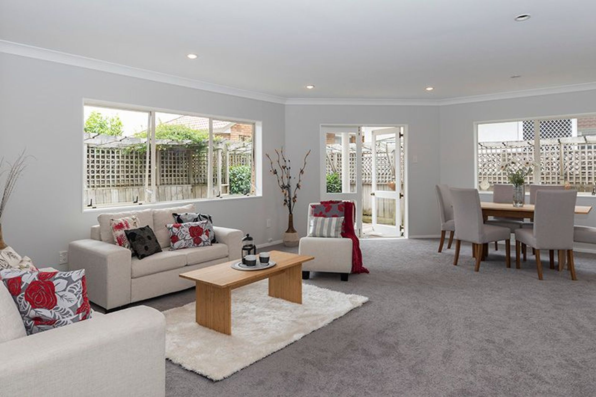 Living Room - Pink carpet and peeling pink wallpaper to this beautiful modern suntrap.
