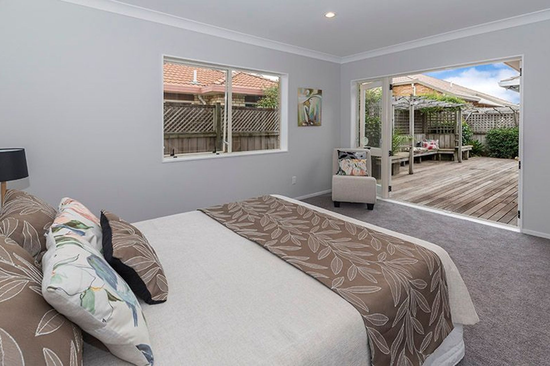 Master Bedroom - Large Master room with ensuite, walk-in wardrobe and double doors to the garden deck. 