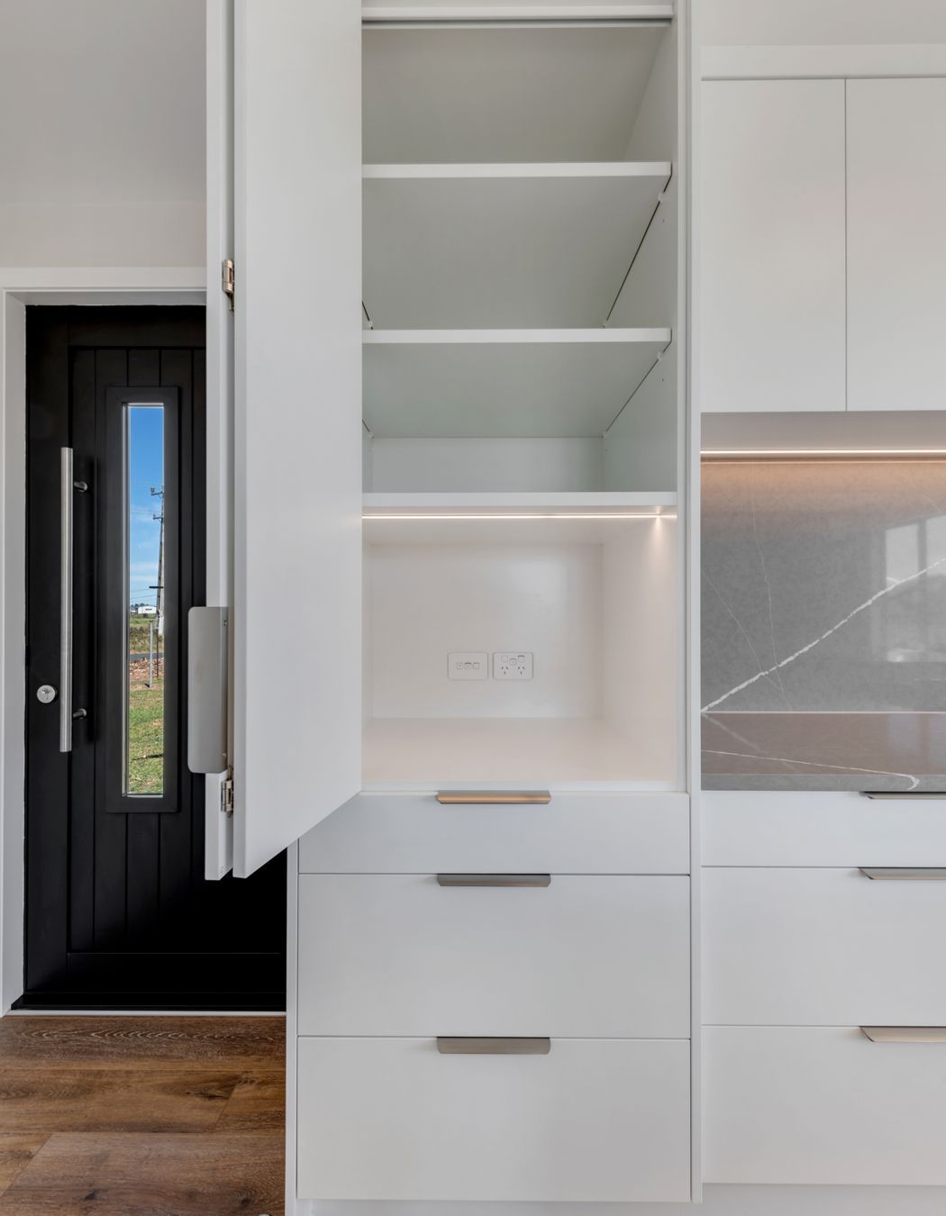 Behind the scenes, still beautifully done. We believe even the hidden spaces deserve attention, this under-sink setup is clean, accessible, and built to stay that way.