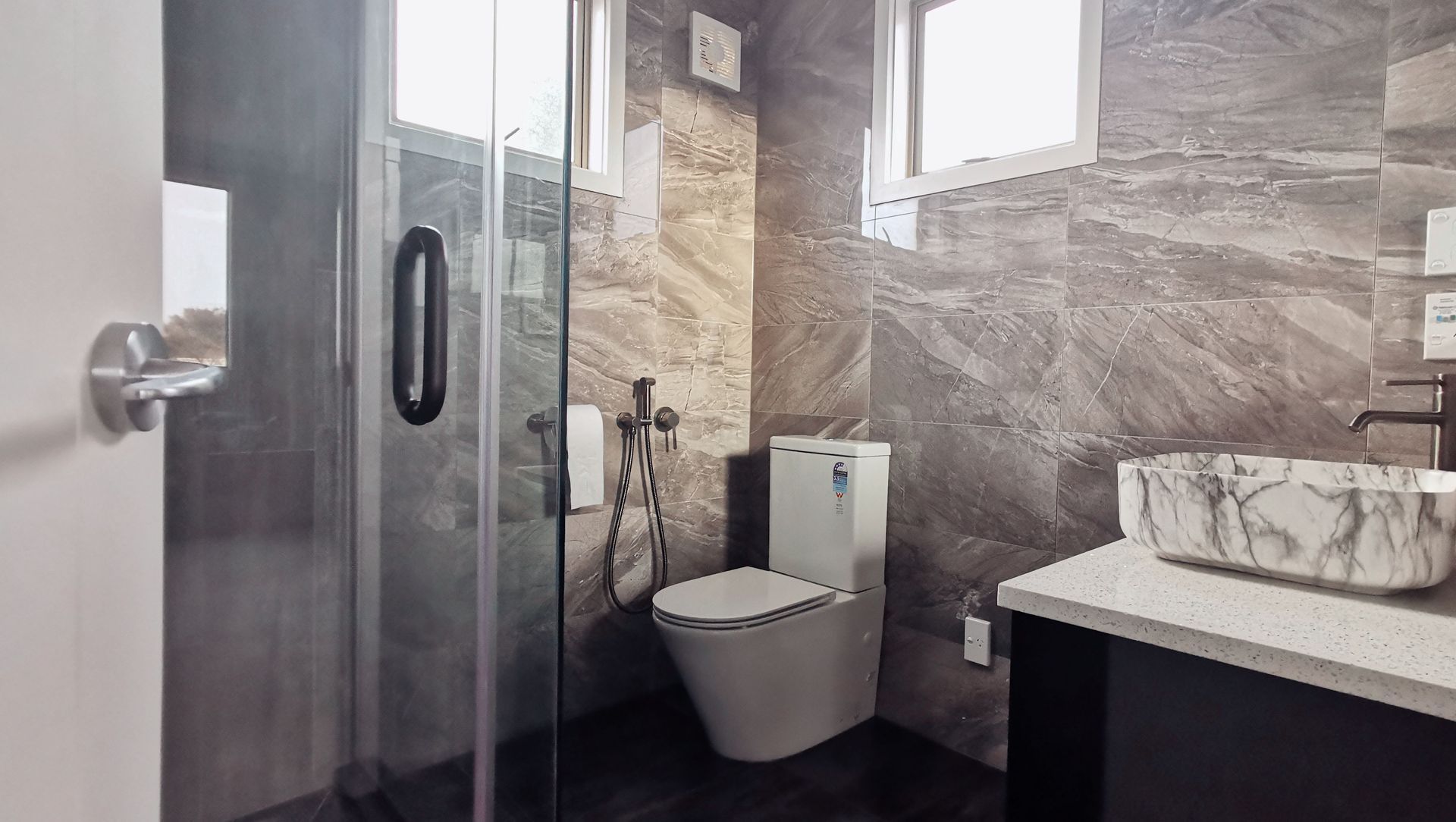 Sleek And Stylish: A Modern Ensuite Renovation banner