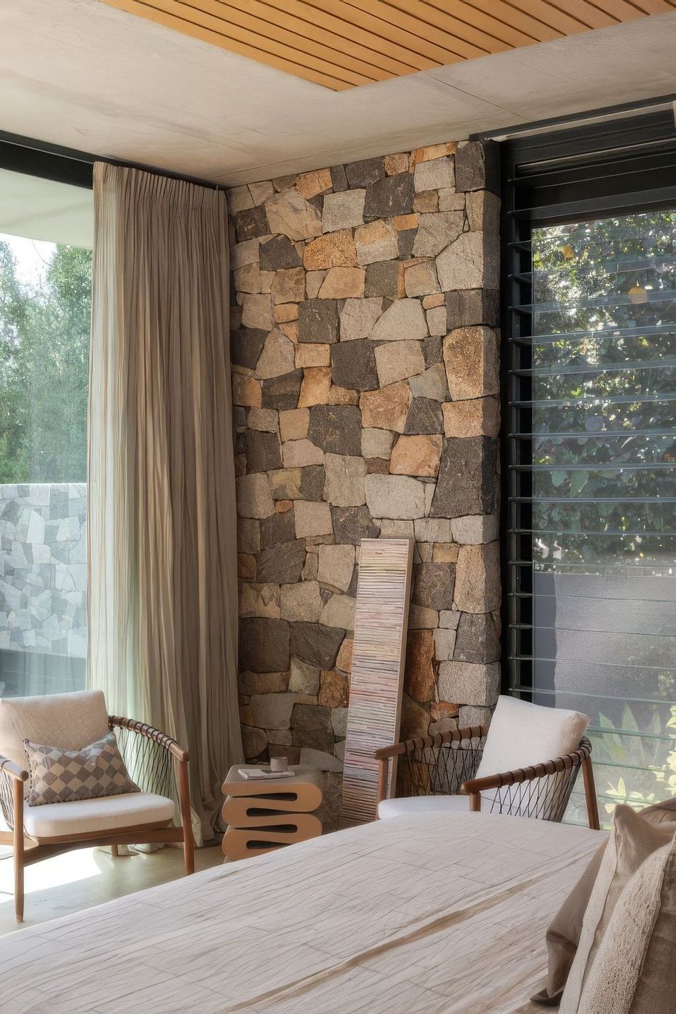 Lantern-House-Bed-Room-with-Stone-Feature-511x767-upscaled-by-Replicate.jpg