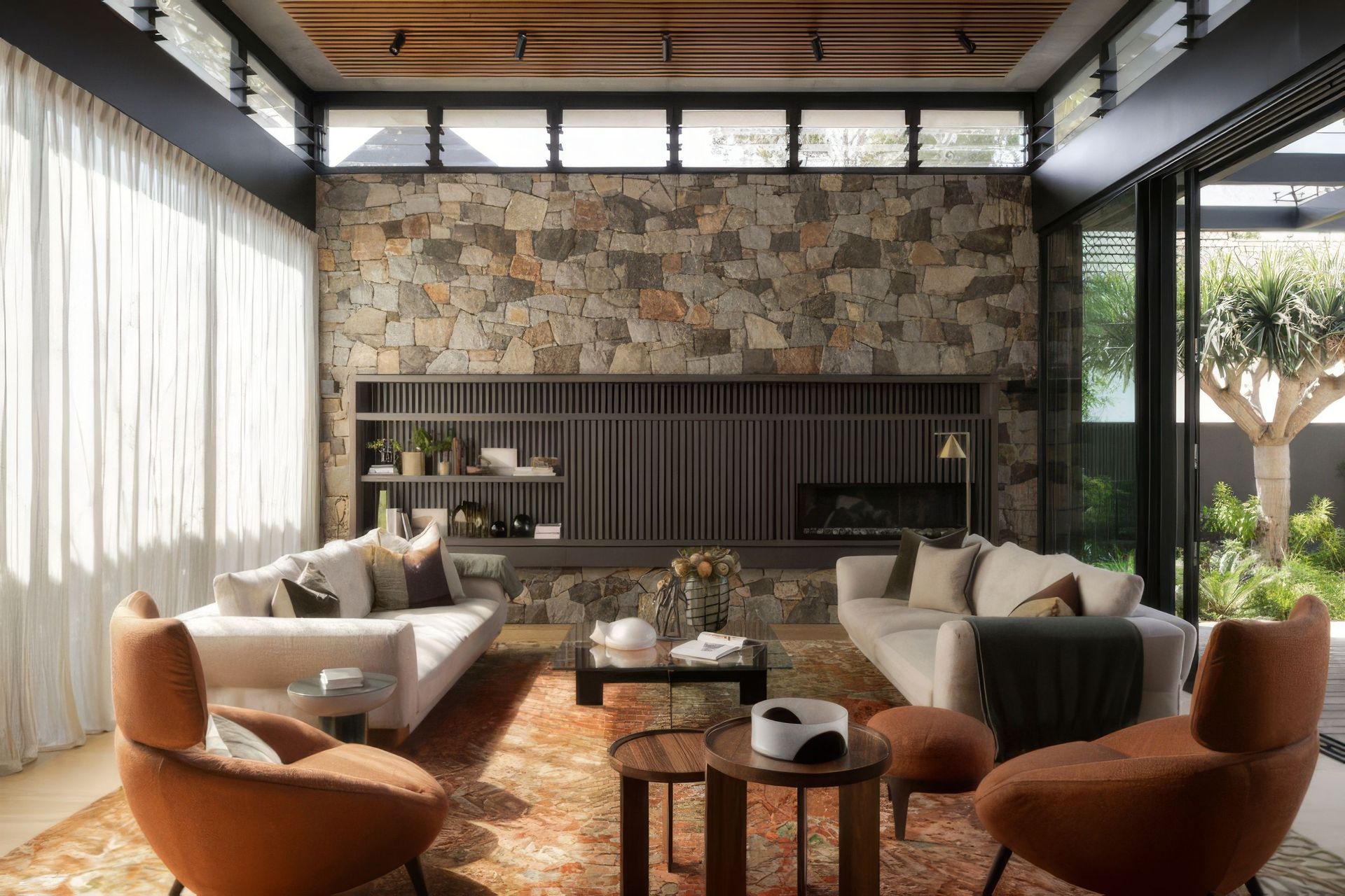 Lantern-House-Living-Deck-Curtained-767x511-upscaled-by-Replicate.jpg