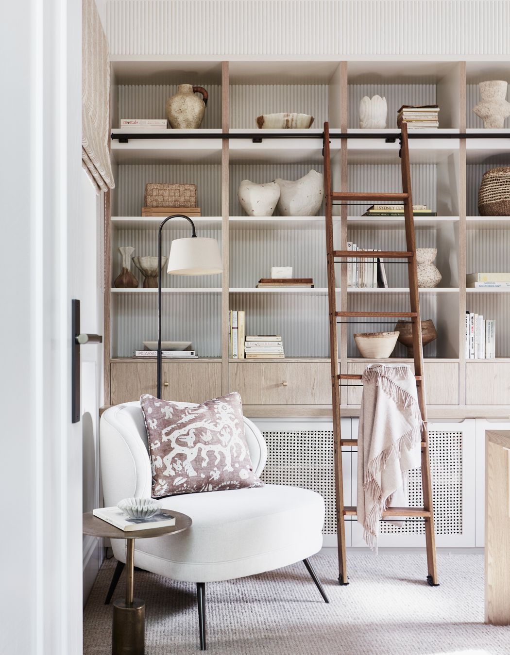 STUDY Library ladder, Ladder Central. Floor lamp, existing. Arteriors ‘Kitts’ armchair, Boyd Blue. Side table, Ideas 4 Lighting. Cushion in Lewis & Wood ‘Iliad’ fabric, Elliott Clarke.