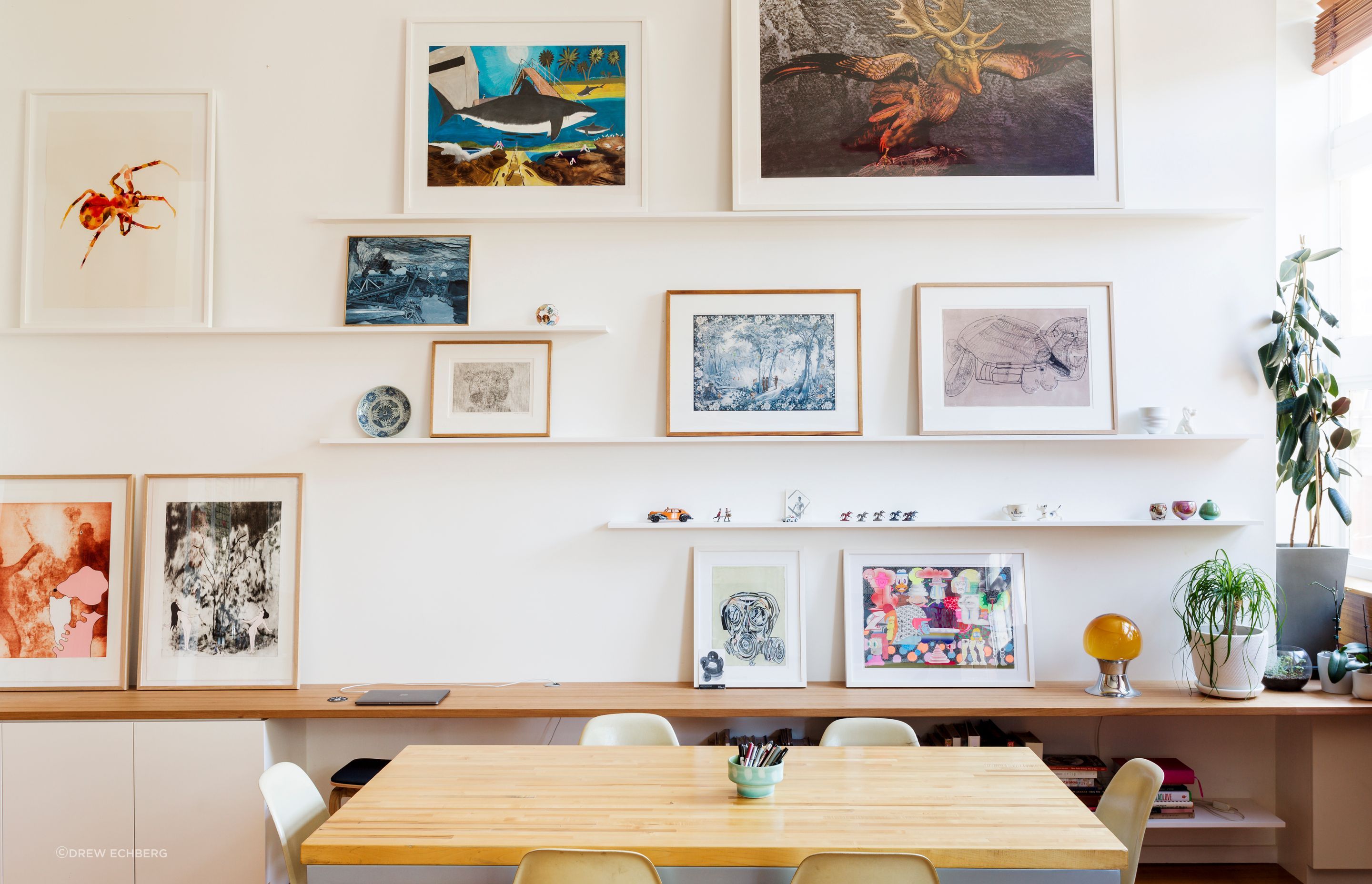 Floating shelves for framed artworks and small display objects