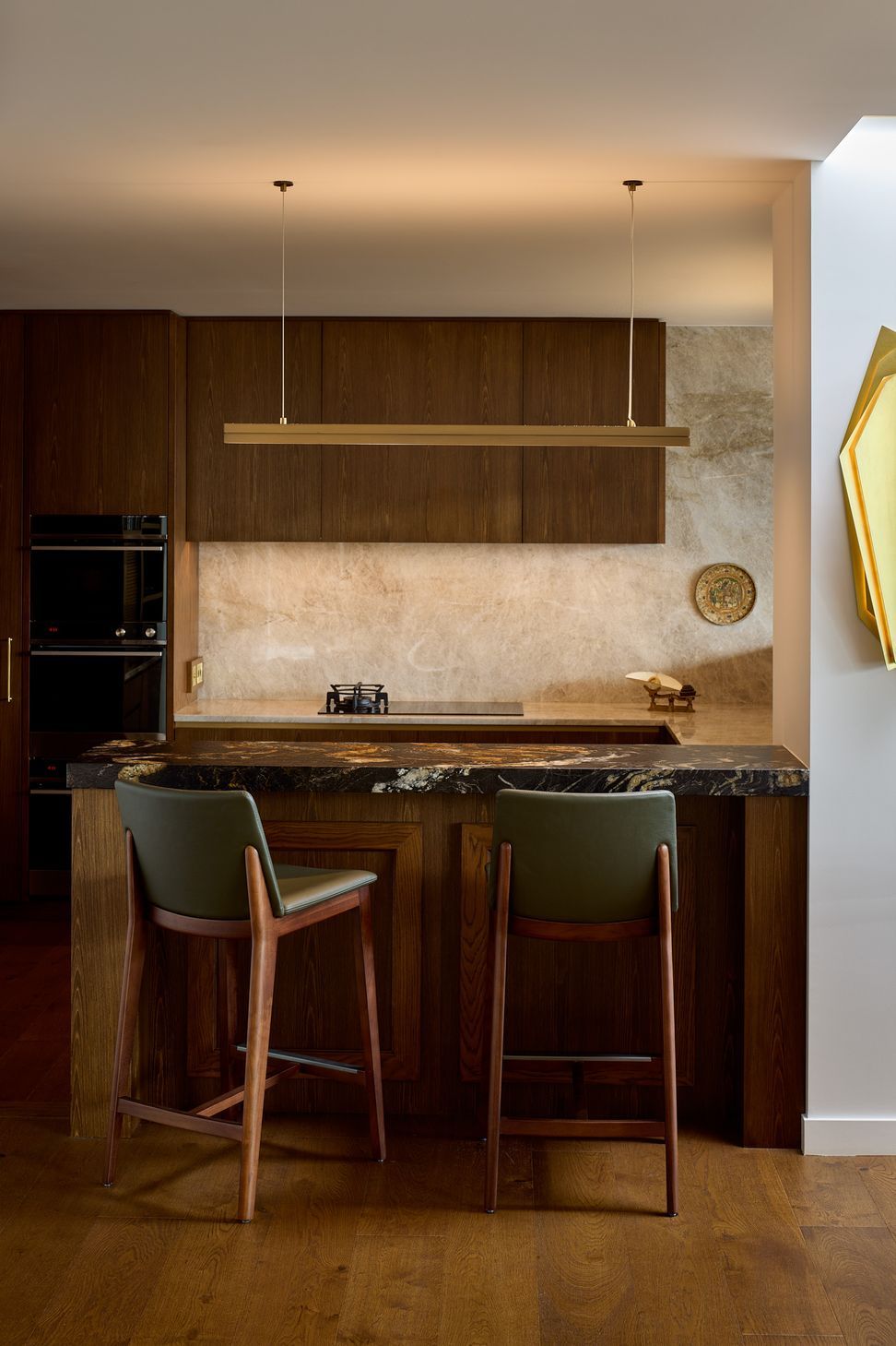 Classic fittings and understated elegance define the kitchen at The High Life, a Queen Street apartment refurbishment by Rogan Nash Architects.