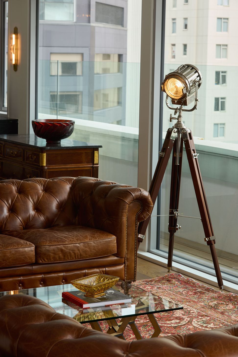 A view of The High Life apartment interior, showcasing the seamless blend of vintage furniture and bespoke design by Rogan Nash Architects.