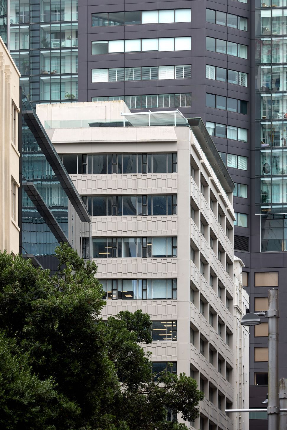 The High Life sits within an existing building above Queen Street, Auckland — transformed by Rogan Nash Architects into a sophisticated inner-city retreat.