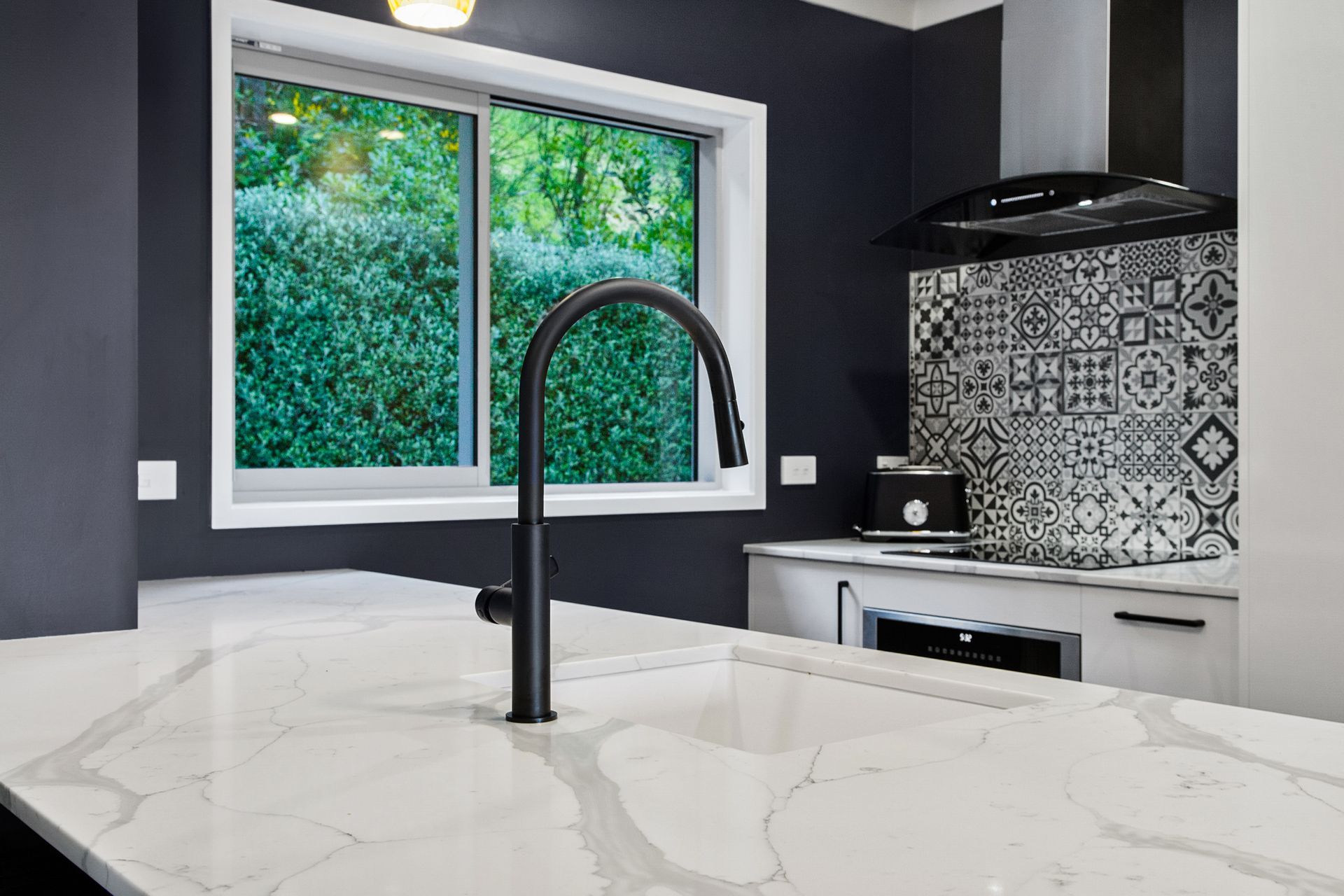 A tired Wellington kitchen gets an exciting new look with both stylish and practical elements achieved on a budget