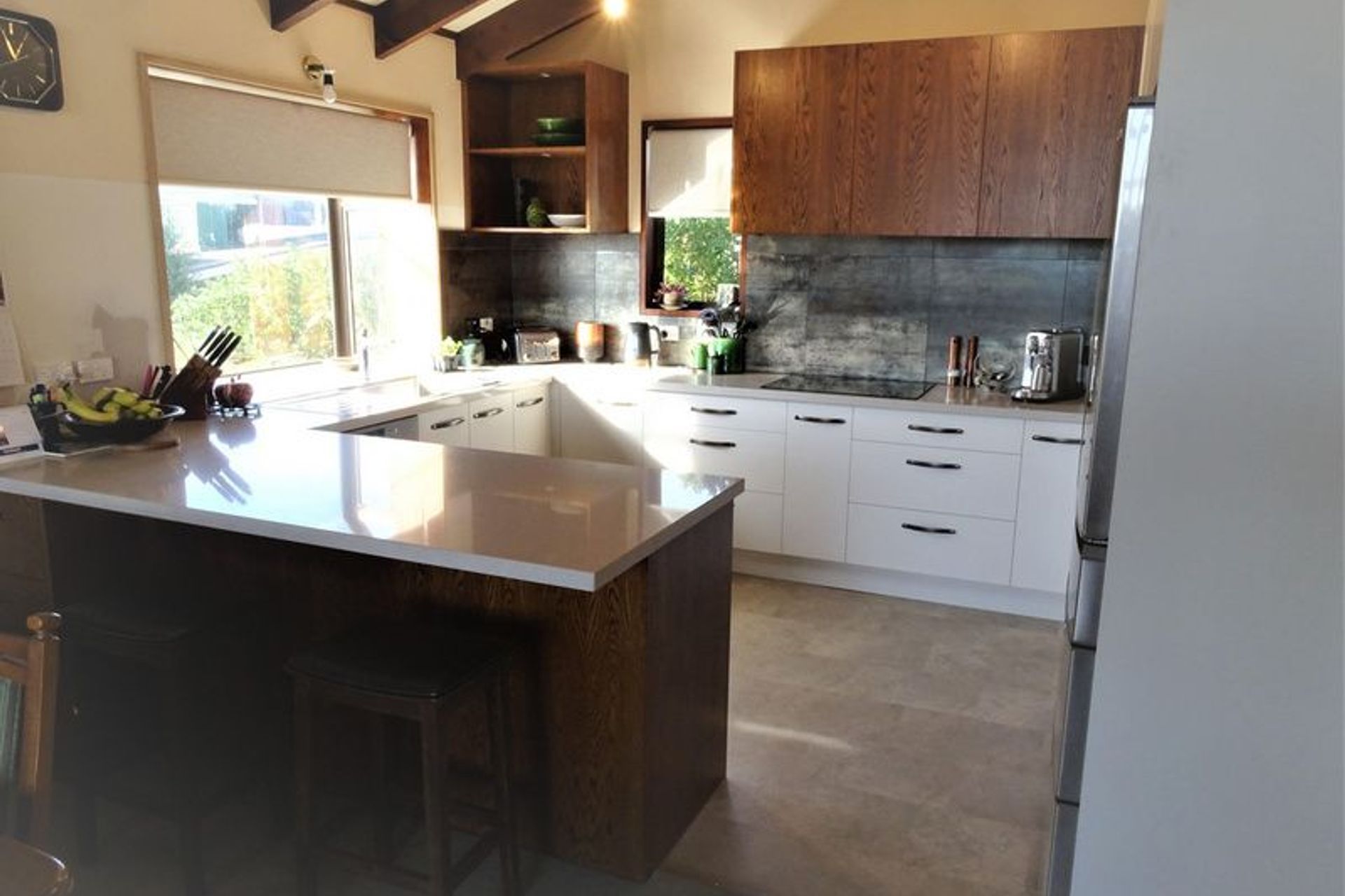 The drawers work in with the kitchen bench material adding to the space