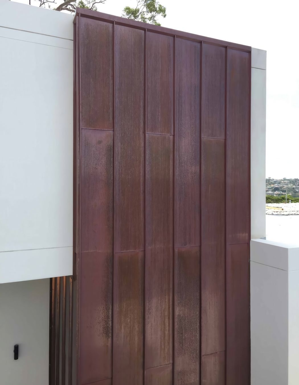 archipro-Standing-Seam-Corten-Featured-Exterior-Wall.jpg
