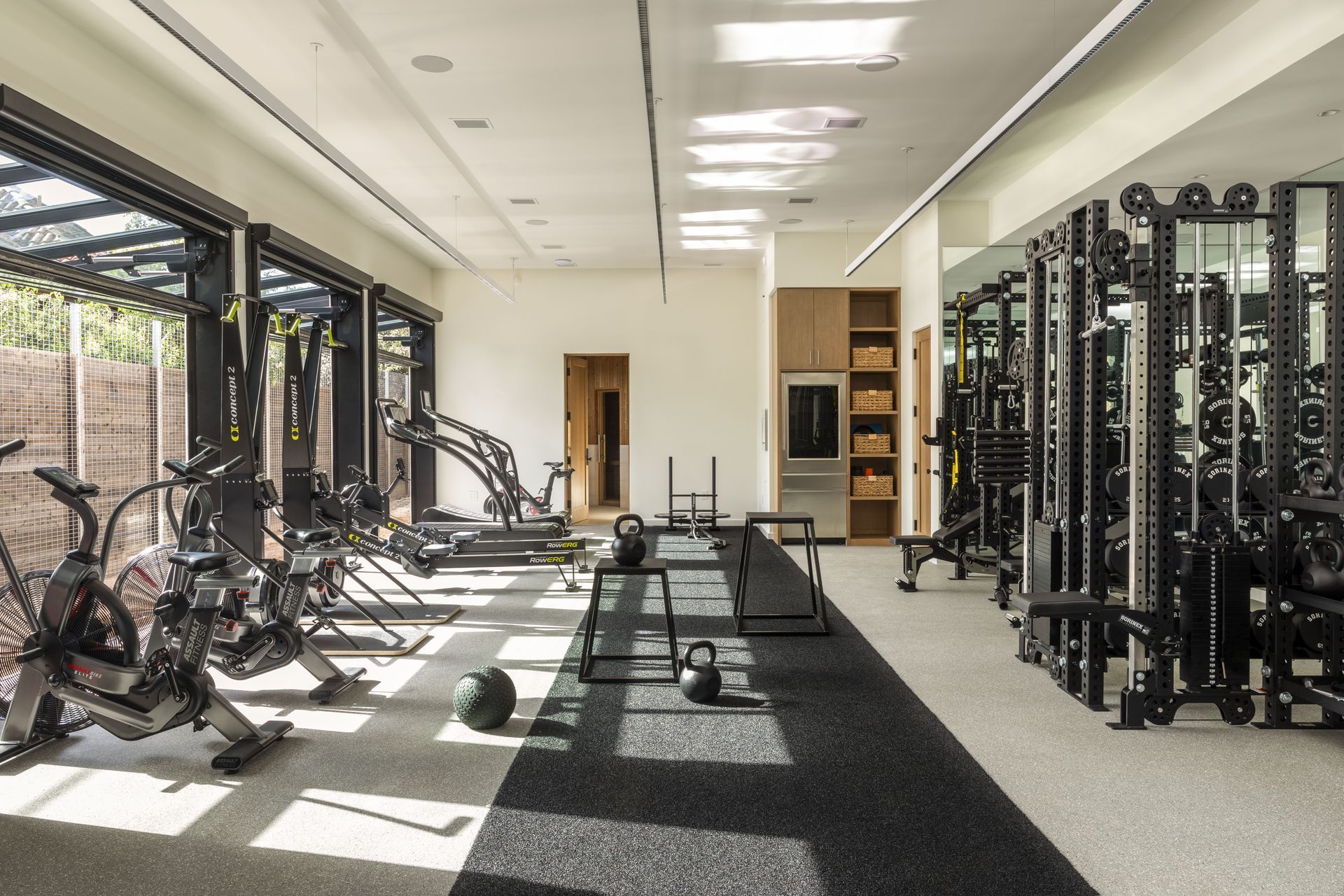 cravotta-interiors-west-austin-world-class-gym-garage-doors-austin.jpg