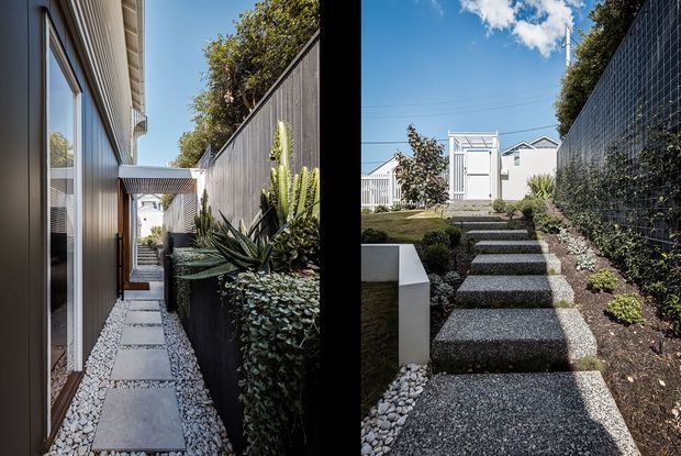 A split view of a narrow contemporary side passage and landscaped garden walkway. The left view shows a long, slender path beside a building with vertical light cladding, glazing, stepping slabs, white gravel, and dense planted beds enclosed by a dark timber fence. The right view shows broad textured aggregate steps rising between dark fencing, gravel, low planting, and a white garden structure under a bright blue sky.