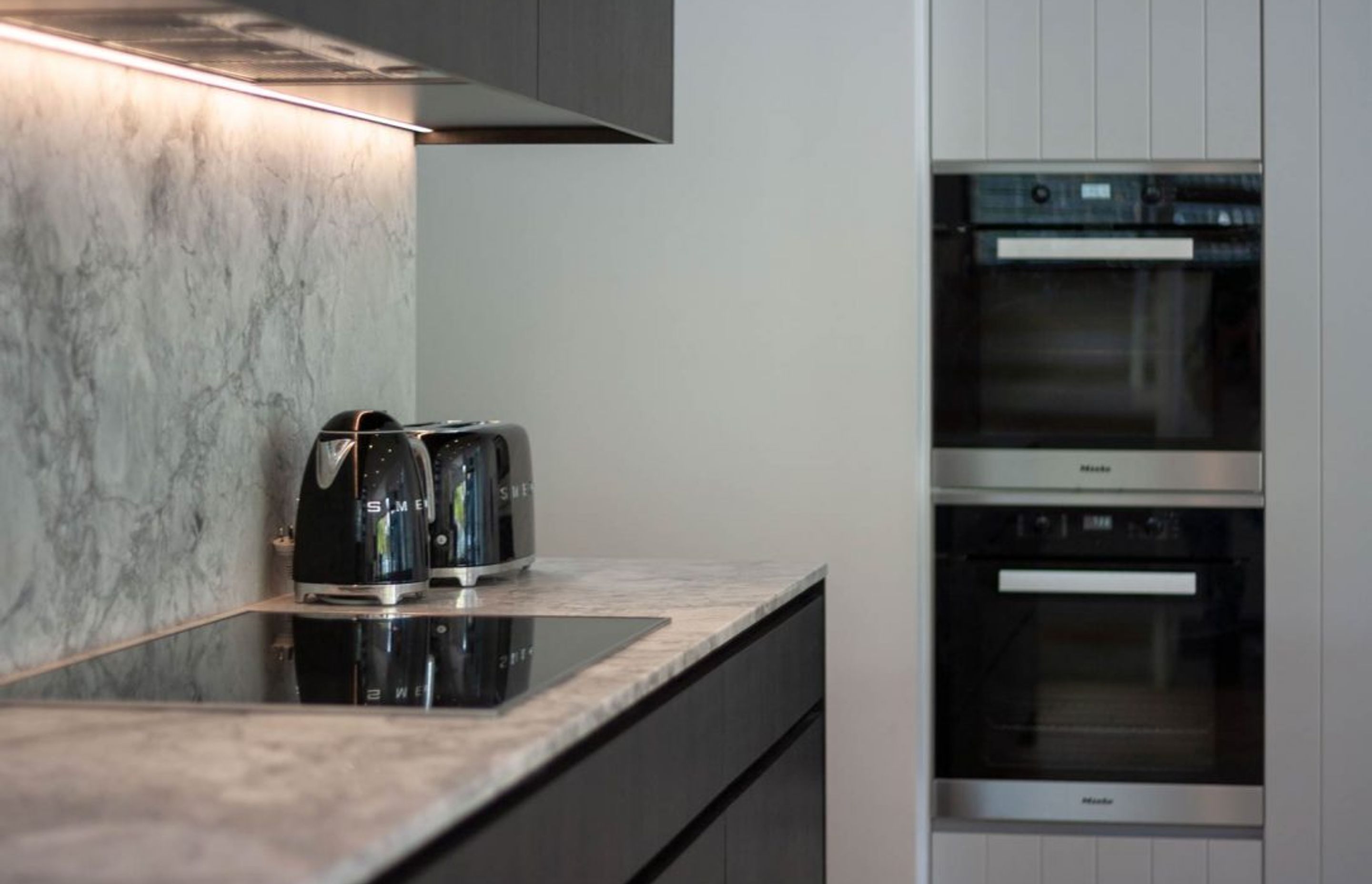 dulux-polyurethane-v-groove-grey-dark-kitchen-design-miele-smeg-butlers-pantry-7215-1-1084x723.jpg