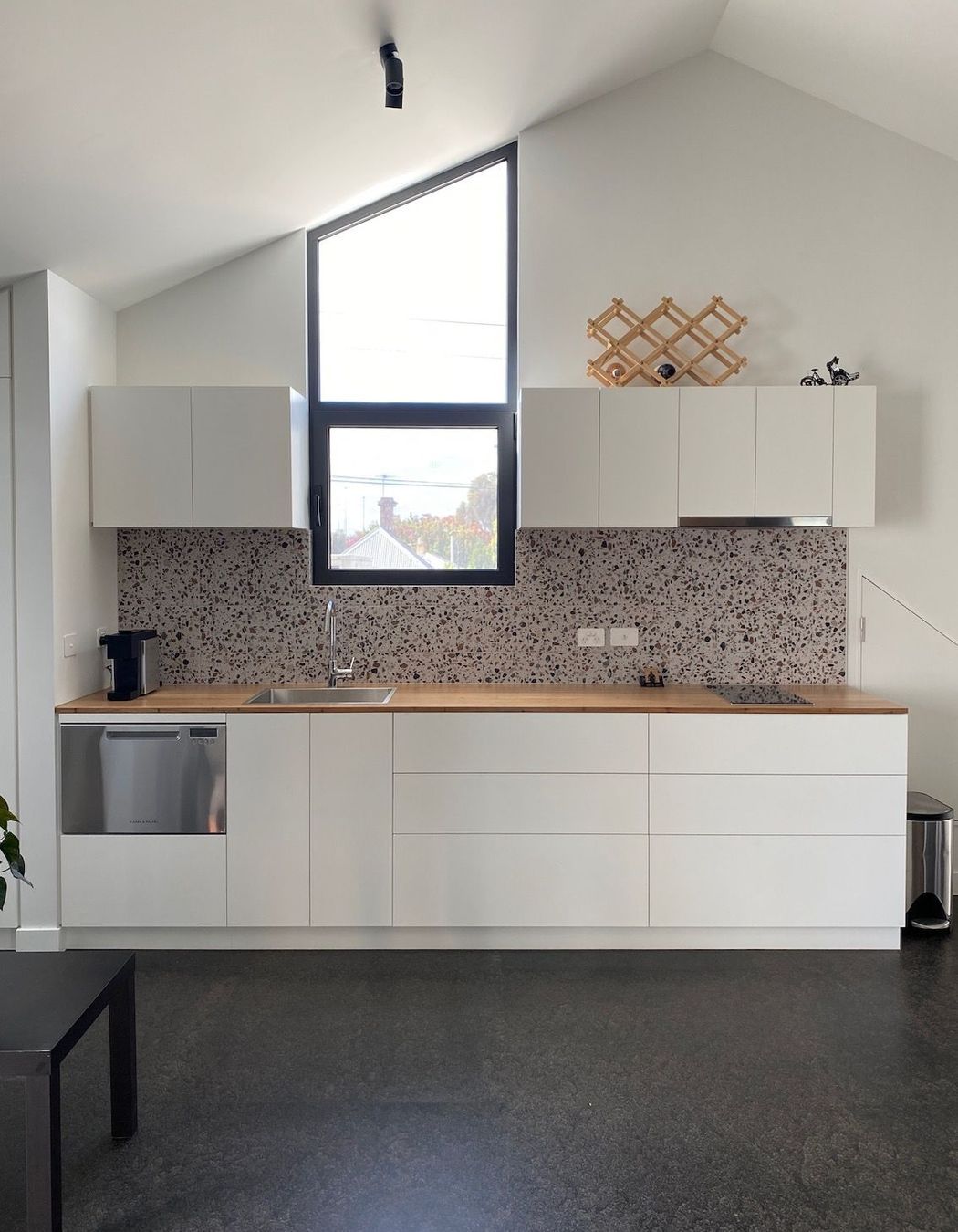 Minimal kitchen with terrazzo splashback
