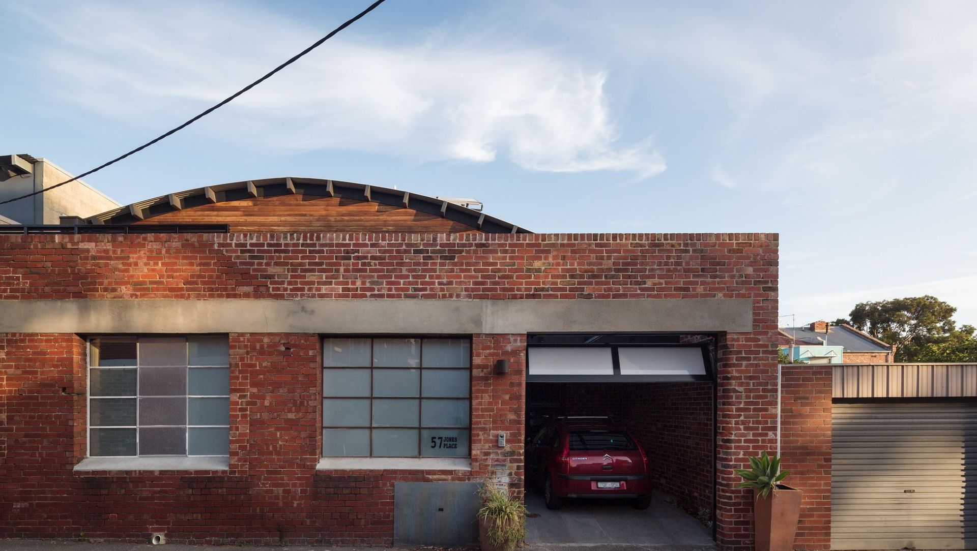 Brick exterior passive warehouse conversion