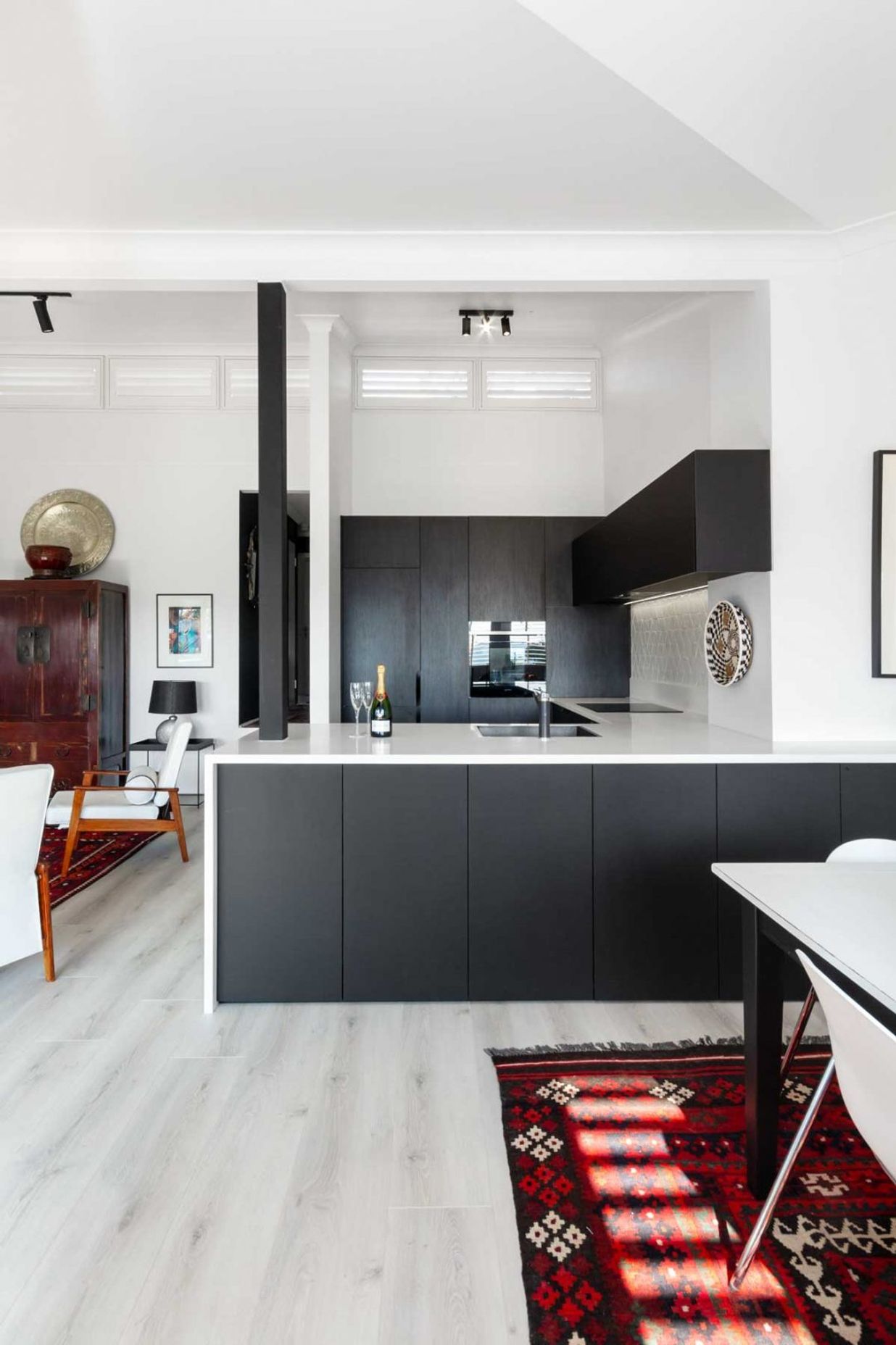 modern-kitchen-design-sydney-bosch-smeg-blanco-black-cabinets-white-benchtop-1a-1084x1626.jpg