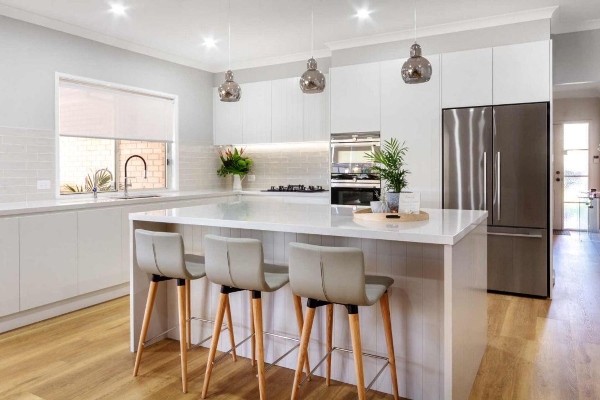 modern-kitchen-design-sydney-white-kitchen-bosch-fisher-paykel-dulux-silestone-siemens-zip-tap-1-1084x723.jpg
