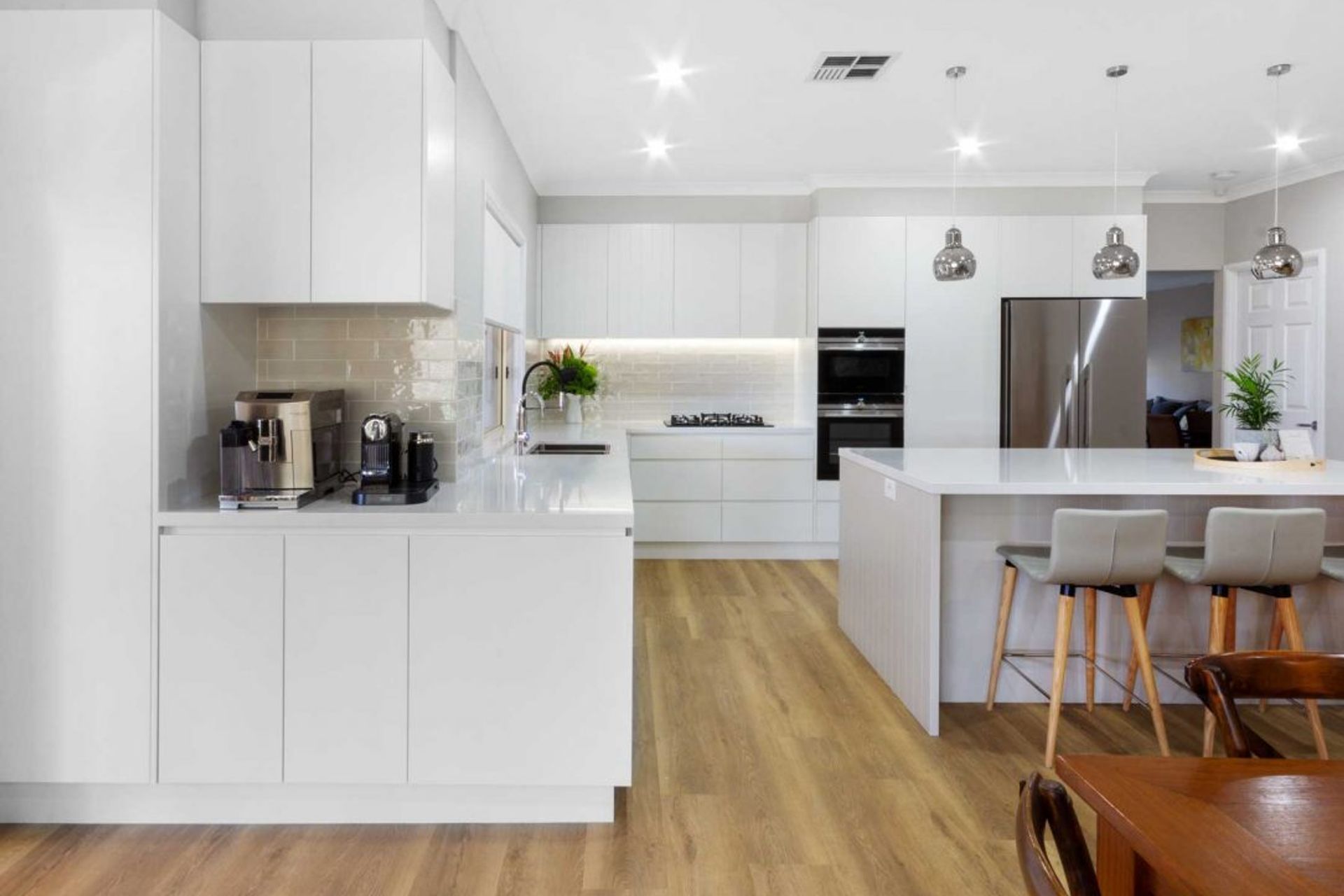 modern-kitchen-design-sydney-white-kitchen-bosch-fisher-paykel-dulux-silestone-siemens-zip-tap-4-1084x750.jpg