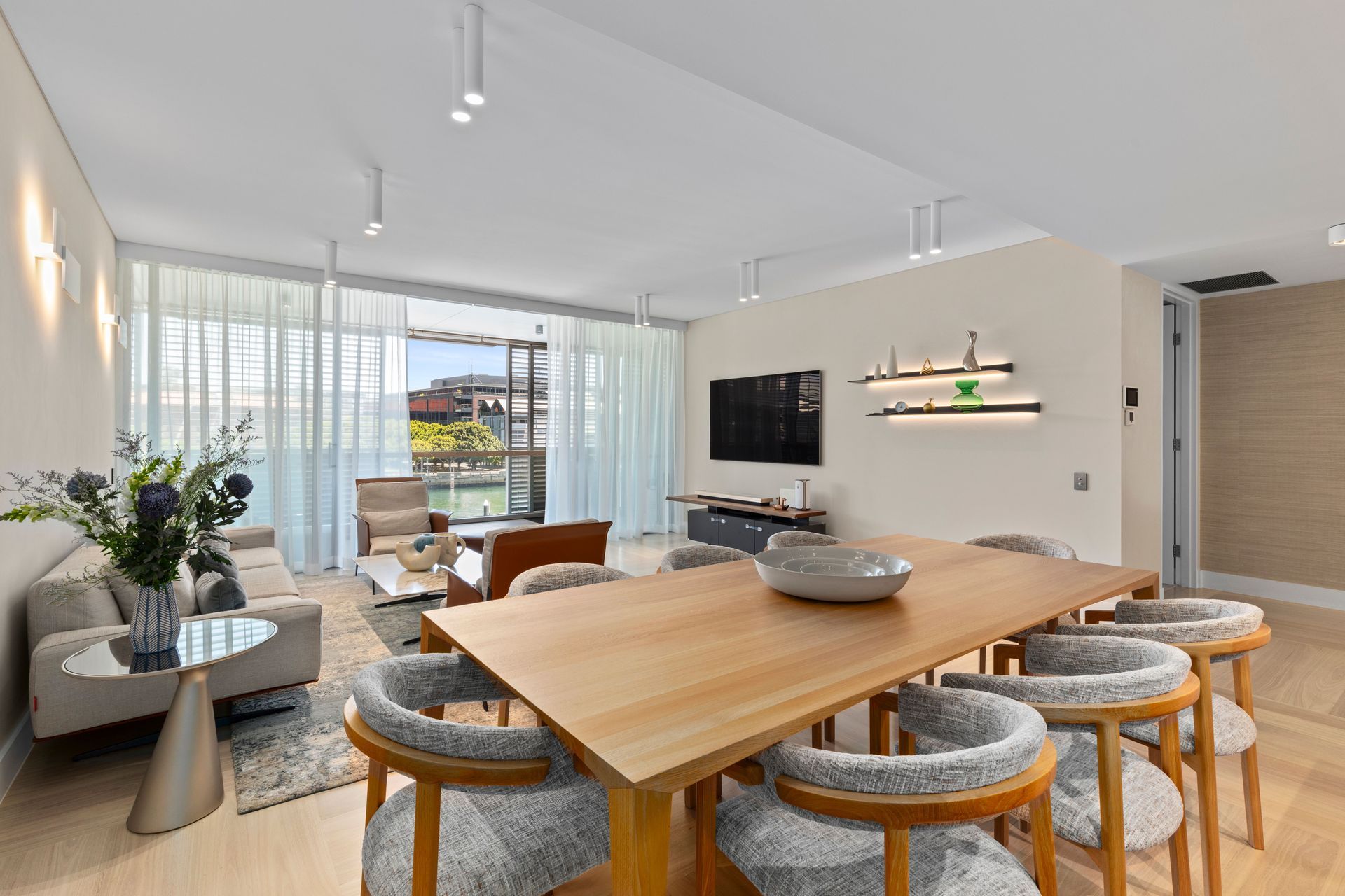 The Living area, dining table and view to the outdoor deck.