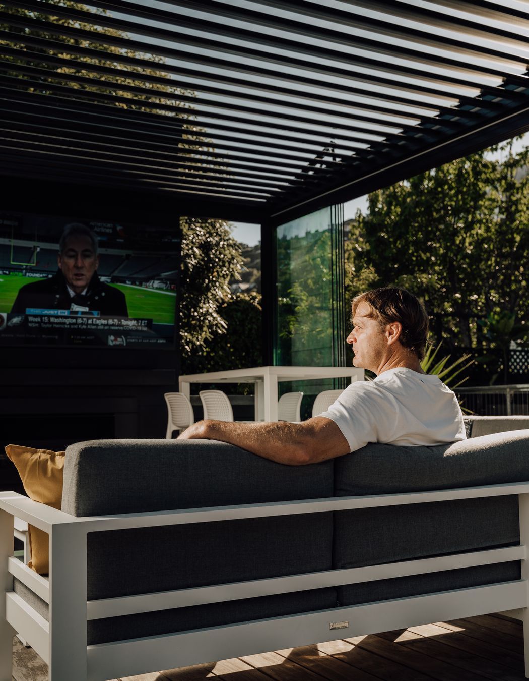 Louvre roof, and Glaslide panels stacked at one end of track.