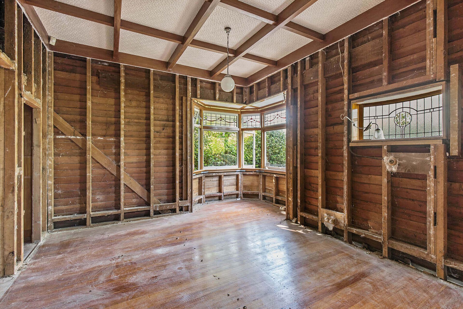 The original master bedroom was gutted before being renovated, with all new insulation being installed.