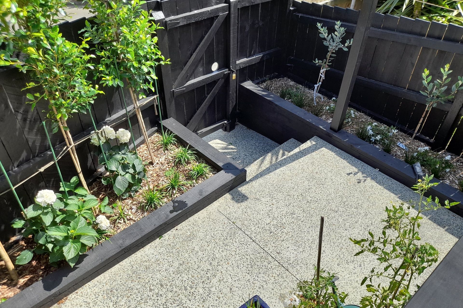 The finished path and gardens provide low maintenance and easy access to the area