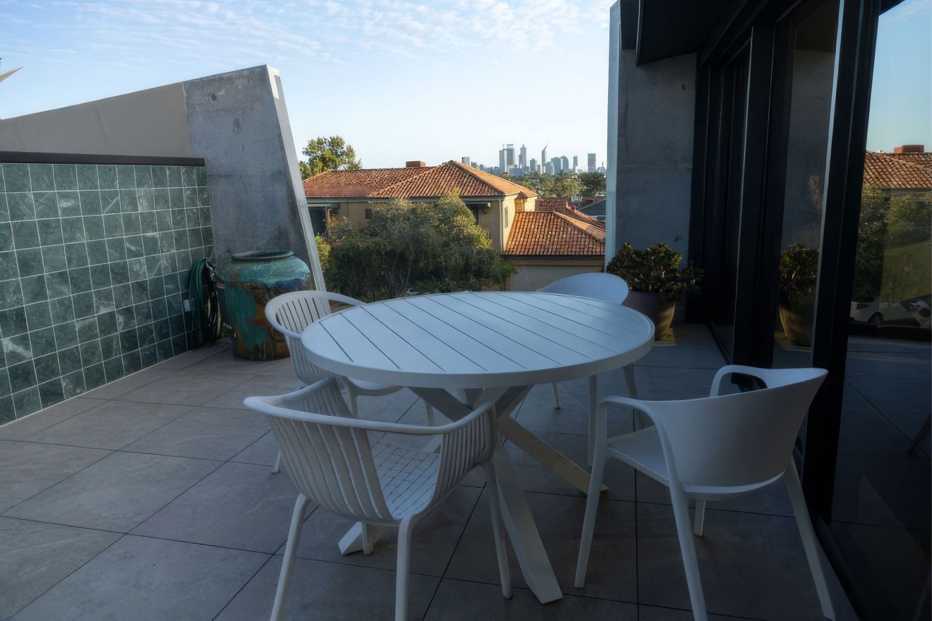 Exterior-pation-view-with-table-and-chairs-RT-Bat-Cave-767x511-upscaled-by-Replicate.jpg
