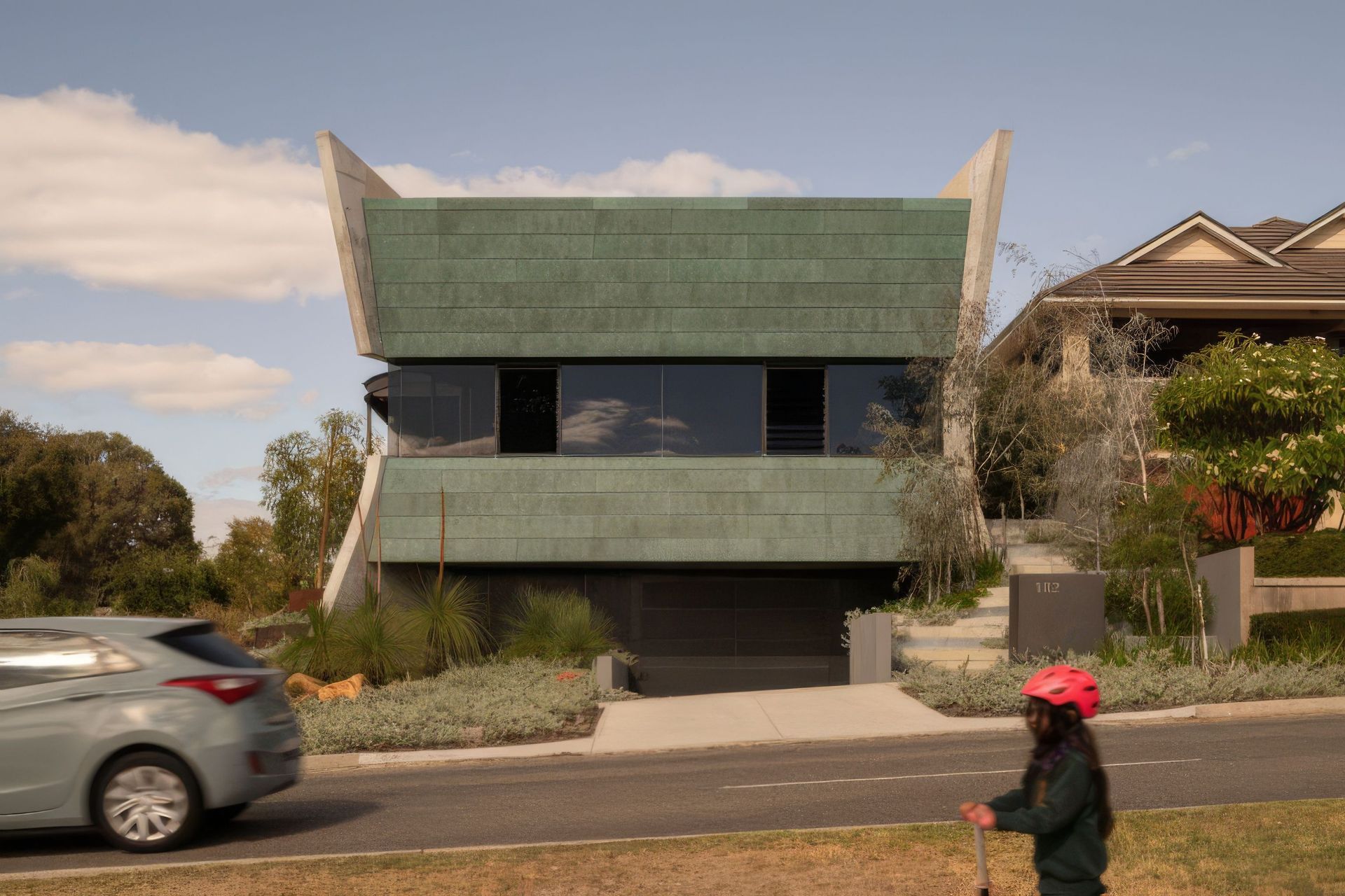 Exterior-street-view-with-car-DR-Bat-Cave-767x511-upscaled-by-Replicate.jpg