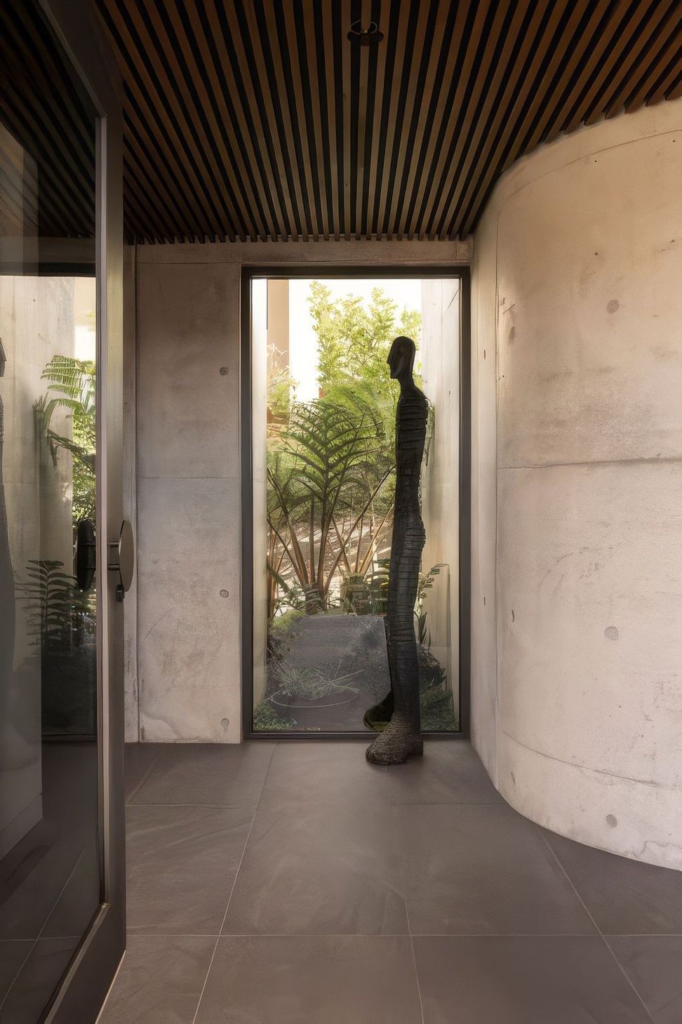 Interior-transition-with-sculpture-DR-Bat-Cave-511x767-upscaled-by-Replicate.jpg