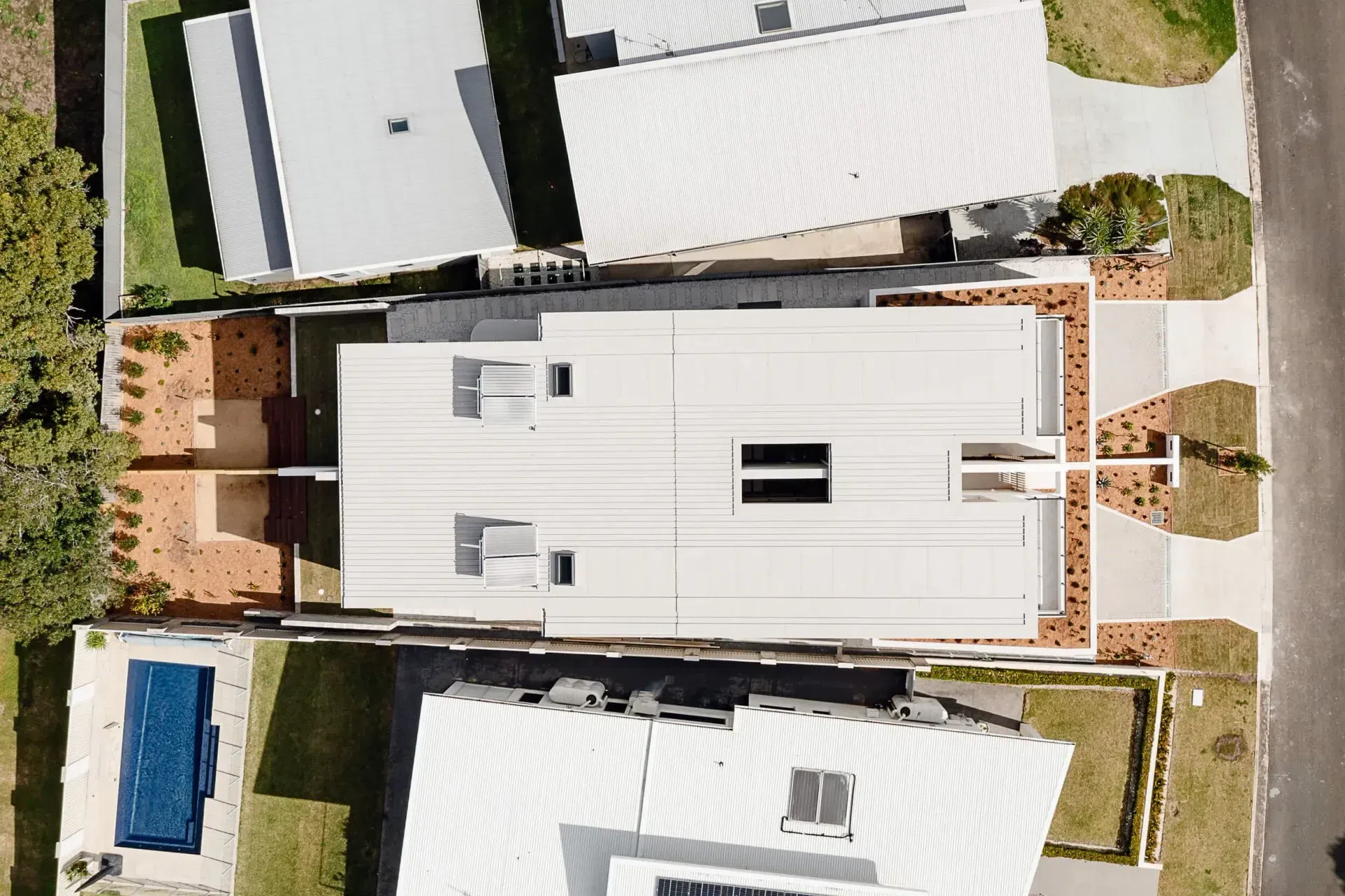 obrien-duplex-bulli-aerial-roof-plan-site-geometry-light-and-lines.webp